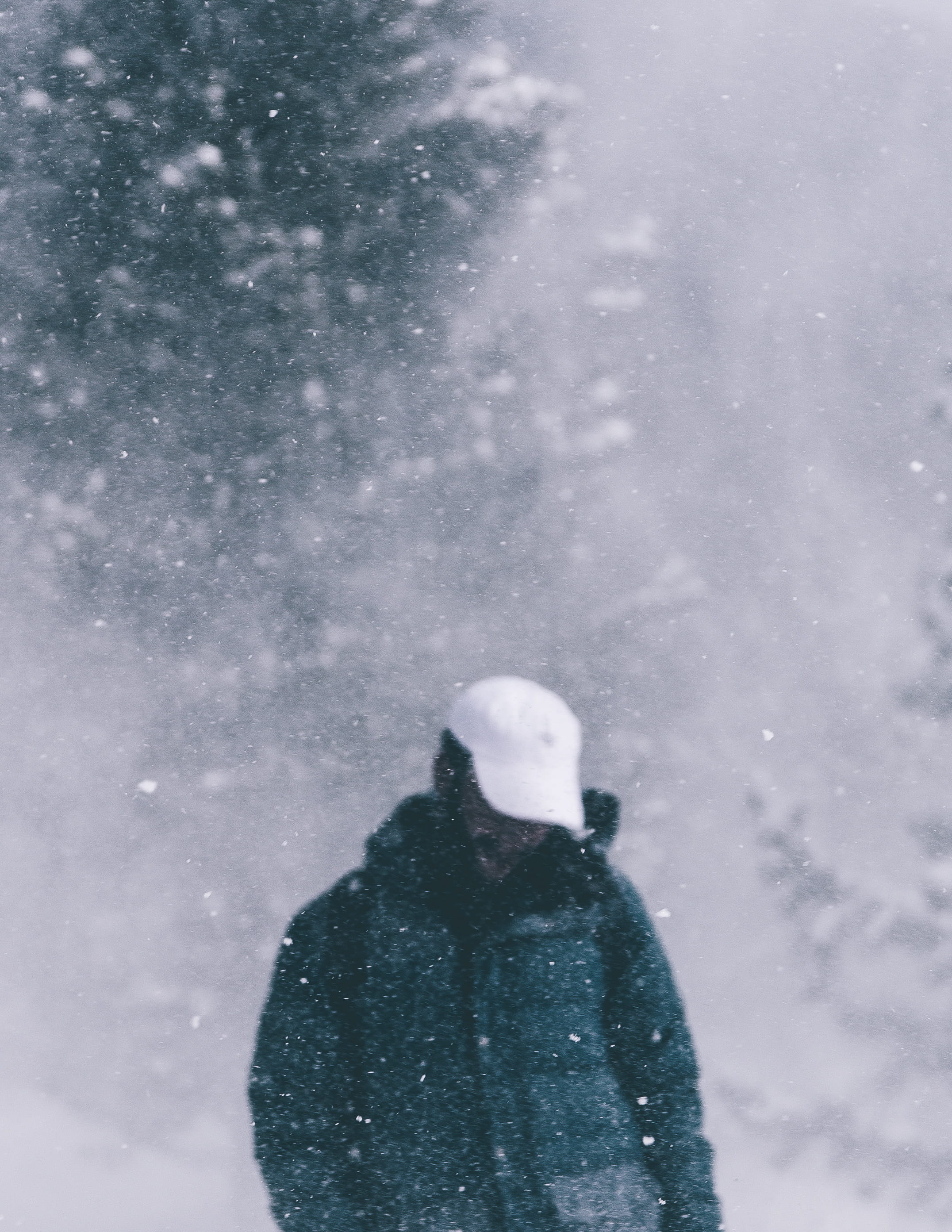 waist up, person, snowing, blue, cold - Temperature, man in black, day, cold temperature, snowsuit, clothing, women, warm clothing, man, fun, walking, standing, Phone HD Wallpaper