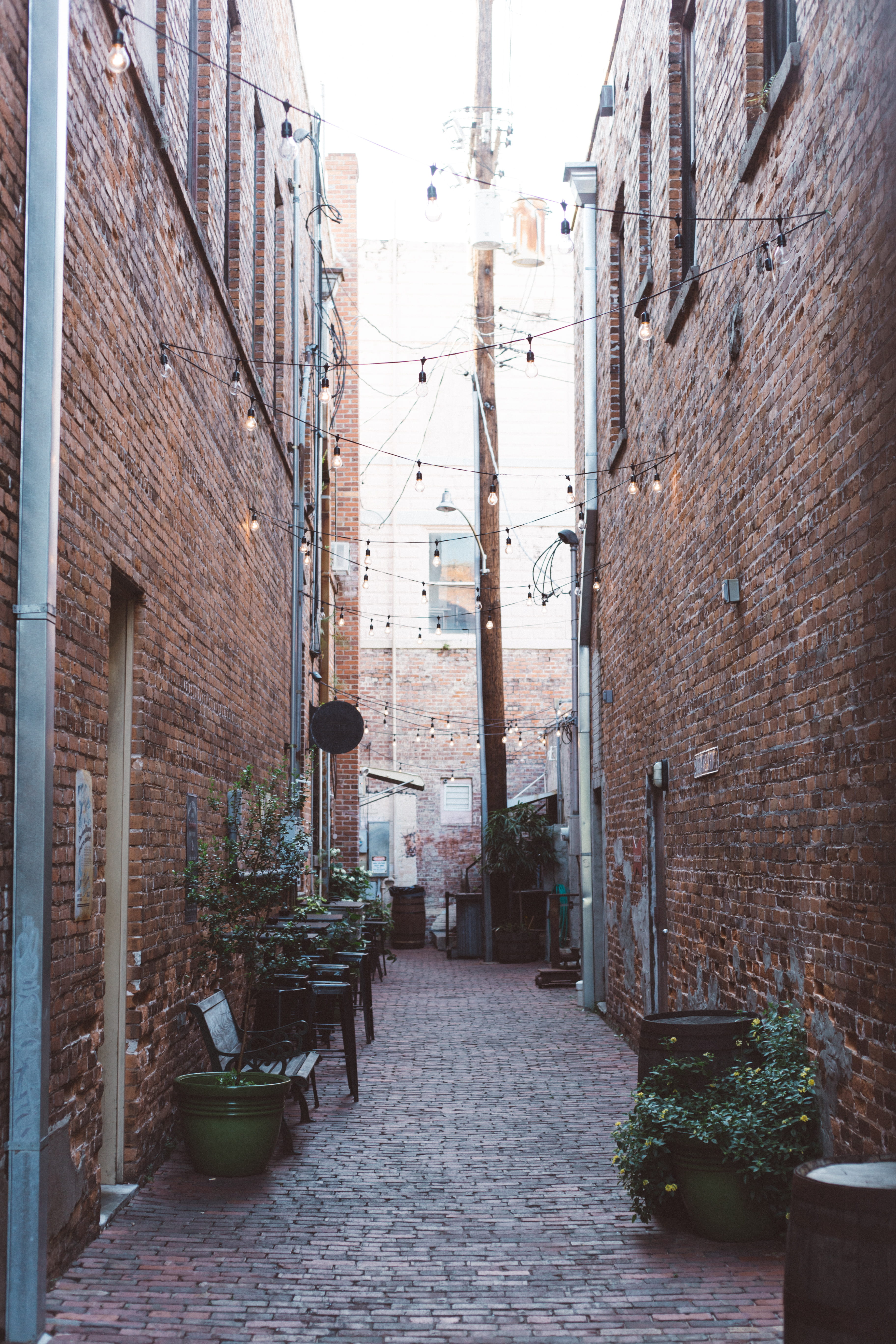 windows, buildings, no people, urban, pots, potted plant, direction, day, narrow, building exterior, street, the way forward, cobblestones, walls, residential district, Phone HD Wallpaper