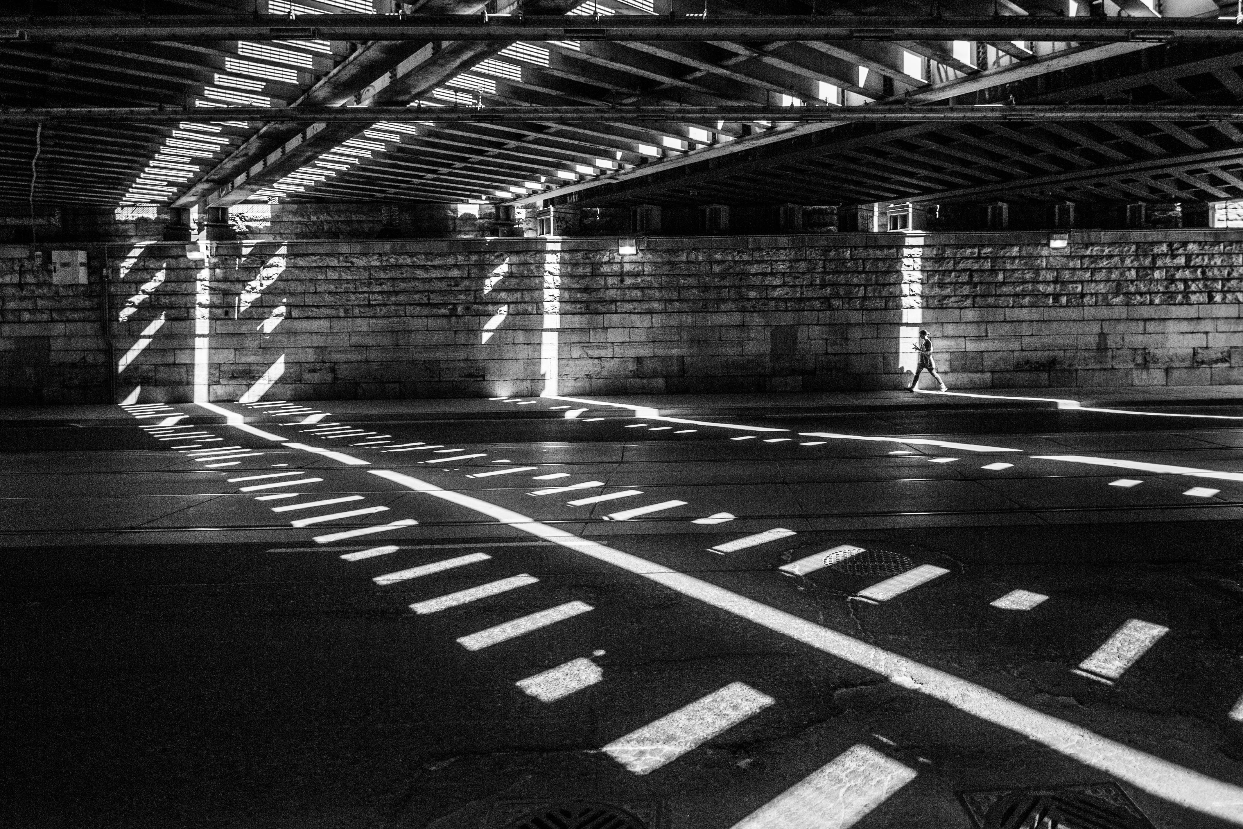 person, road marking, sign, sunlight, 4K, marking, symbol, walking, communication, subway, city, basement, dark, tunnel, architecture, photo, parking garage, HD Wallpaper
