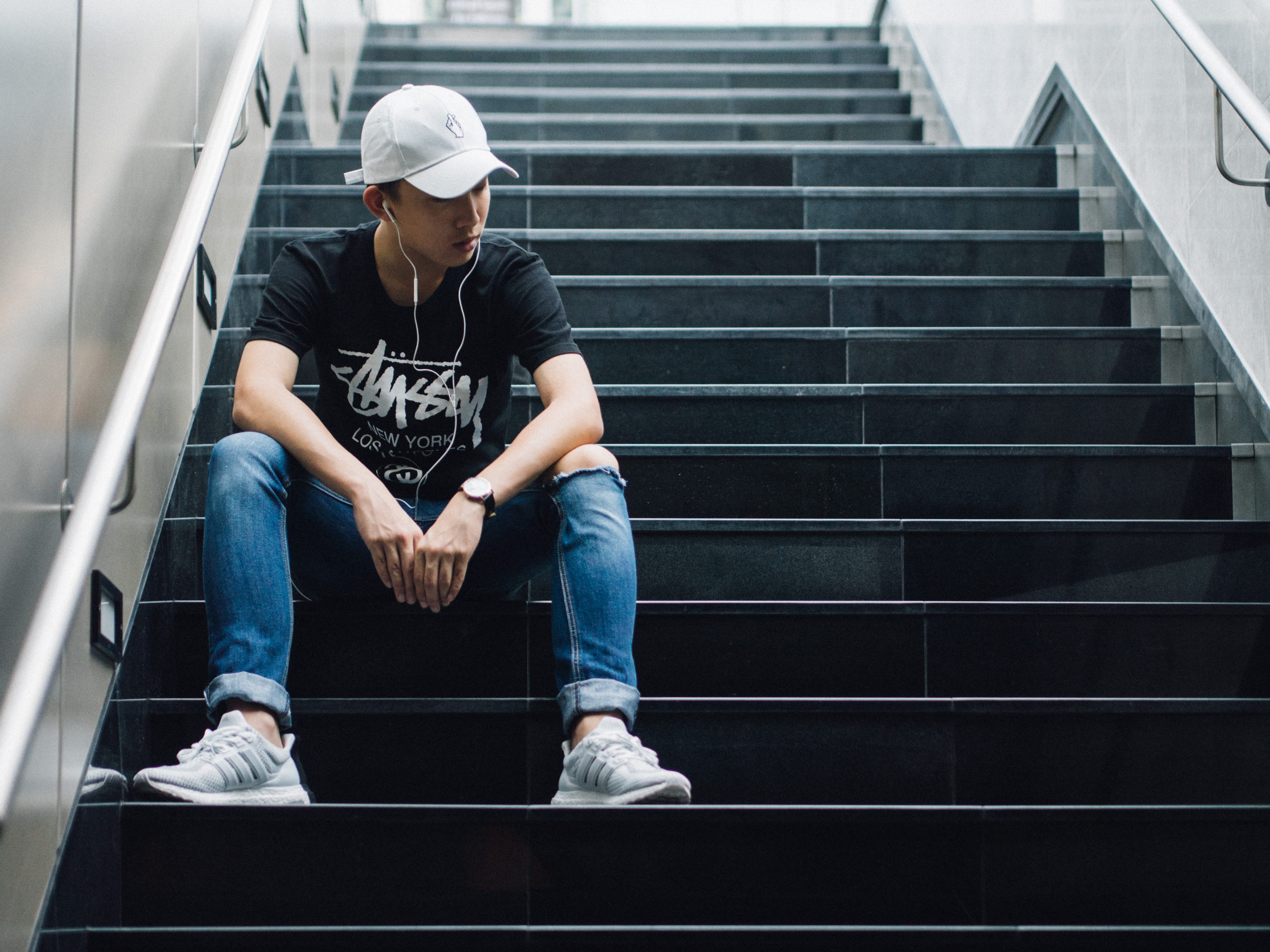 relaxation, outdoors, city, one Person, men, steps and staircases, sitting, front view, sit, architecture, people, stairs, real people, one man only, jeans, HD Wallpaper
