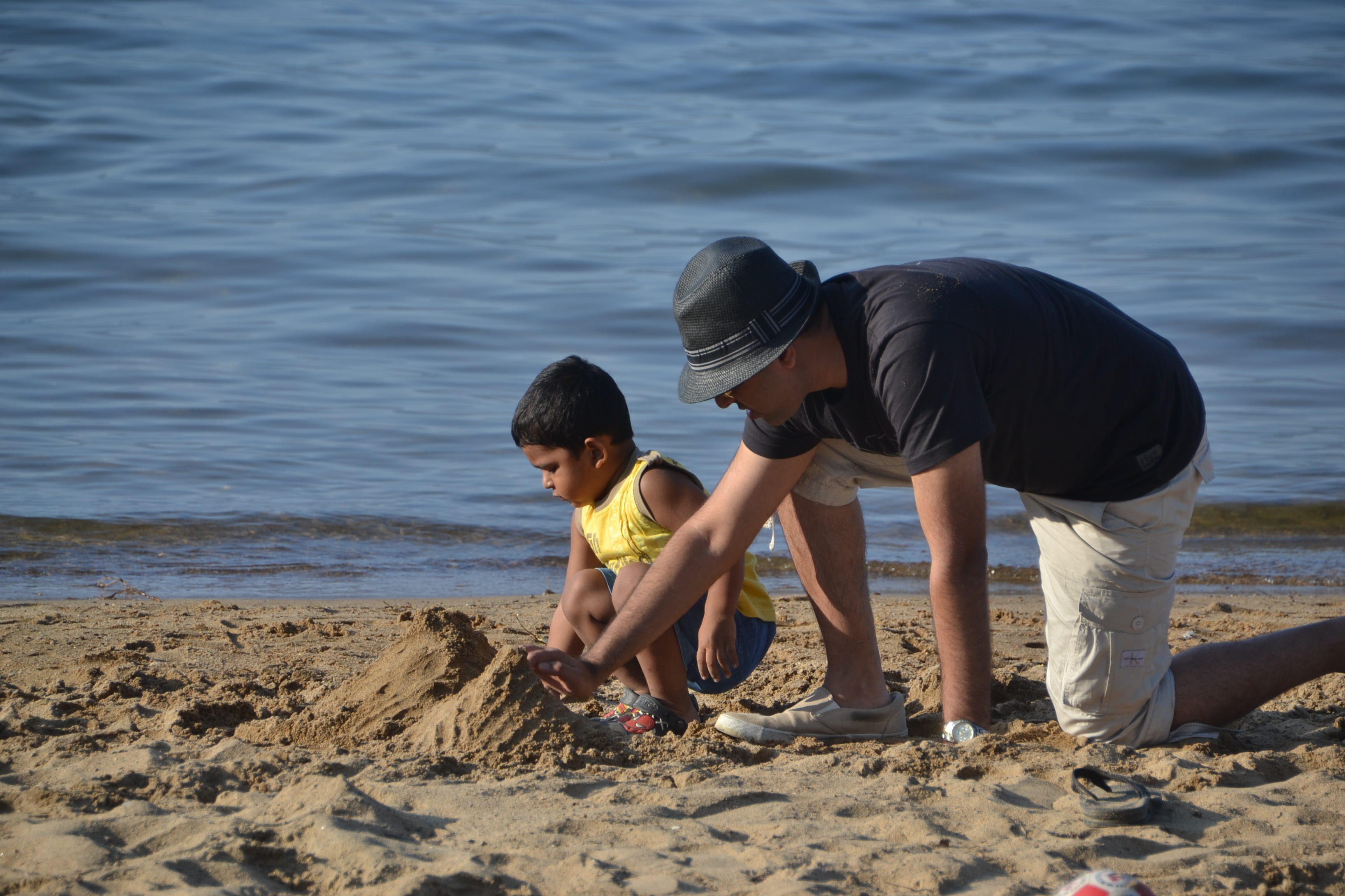 father, lifestyles, son, bonding, real people, sea, sand, son sand, men, two people, child, beach, males, land, innocence, fun, leisure activity, casual clothing, HD Wallpaper