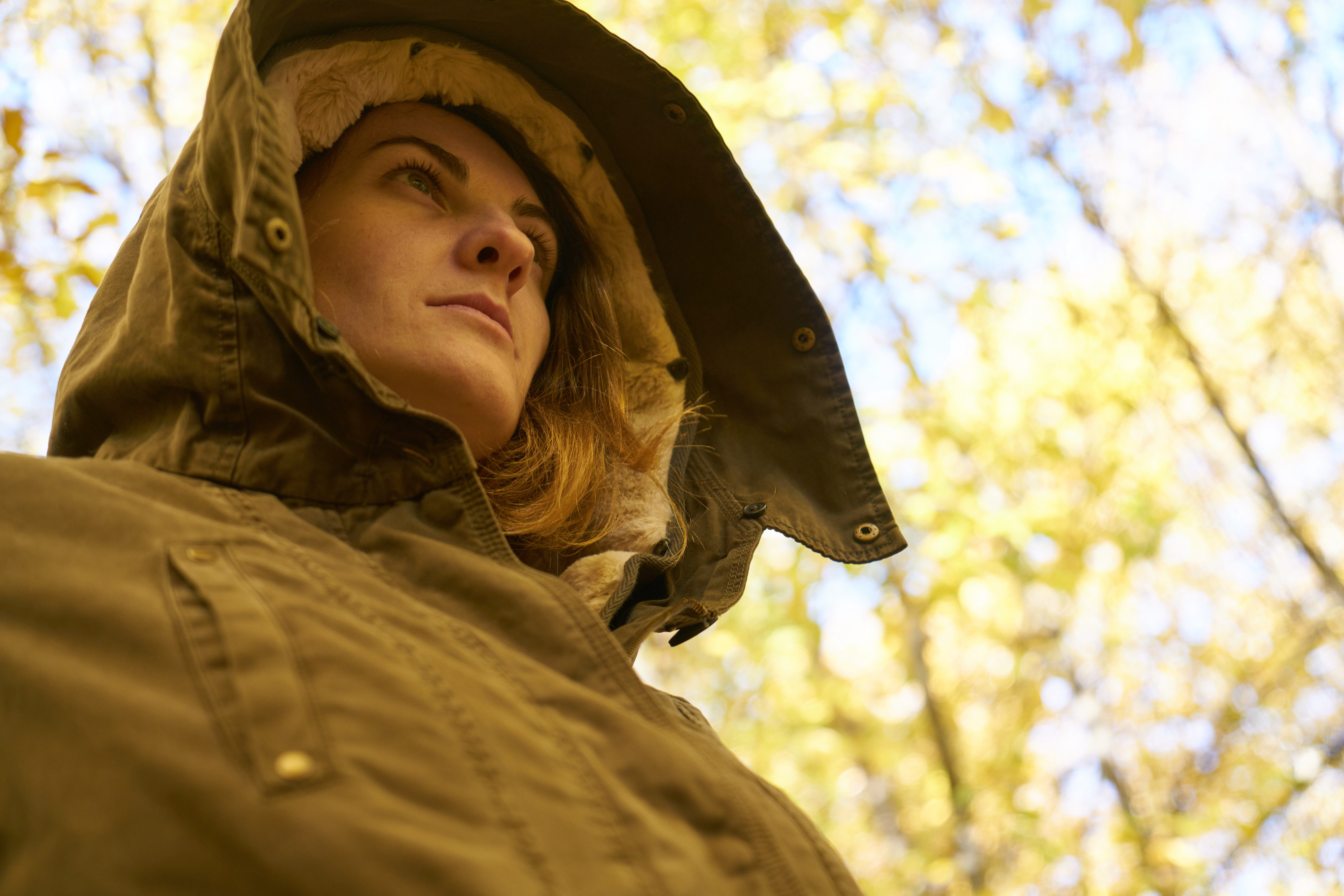 headshot, trees, 5K, hood - clothing, the young woman, young adult, low angle view, mont, human, model, one person, winter, nature, b add, melancholy, HD Wallpaper