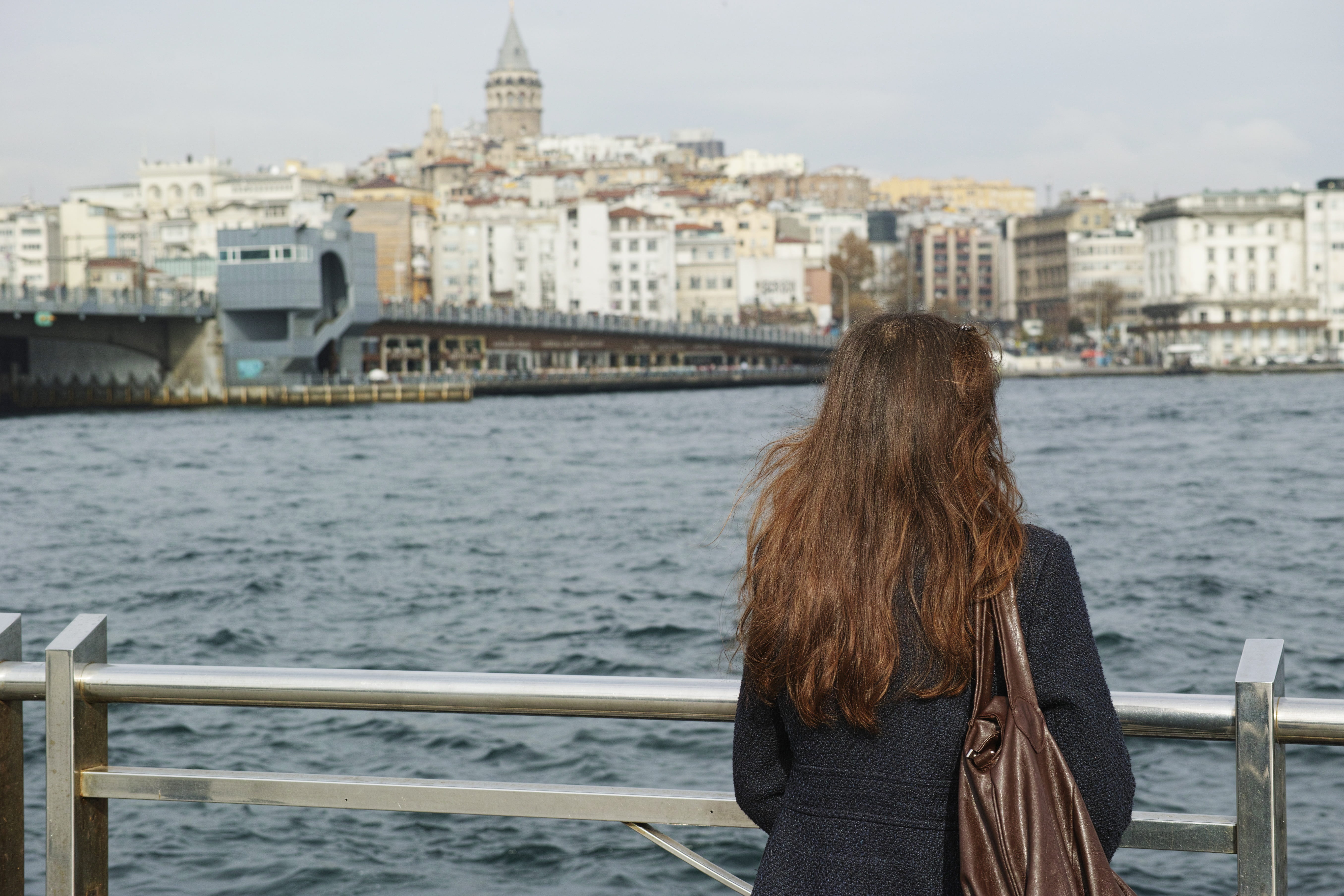 young, stand alone, city, overview, river, 5K, the innocence, sea, beauty, brown hair, young girl, women, estuary, beautiful, leisure activity, b add, HD Wallpaper