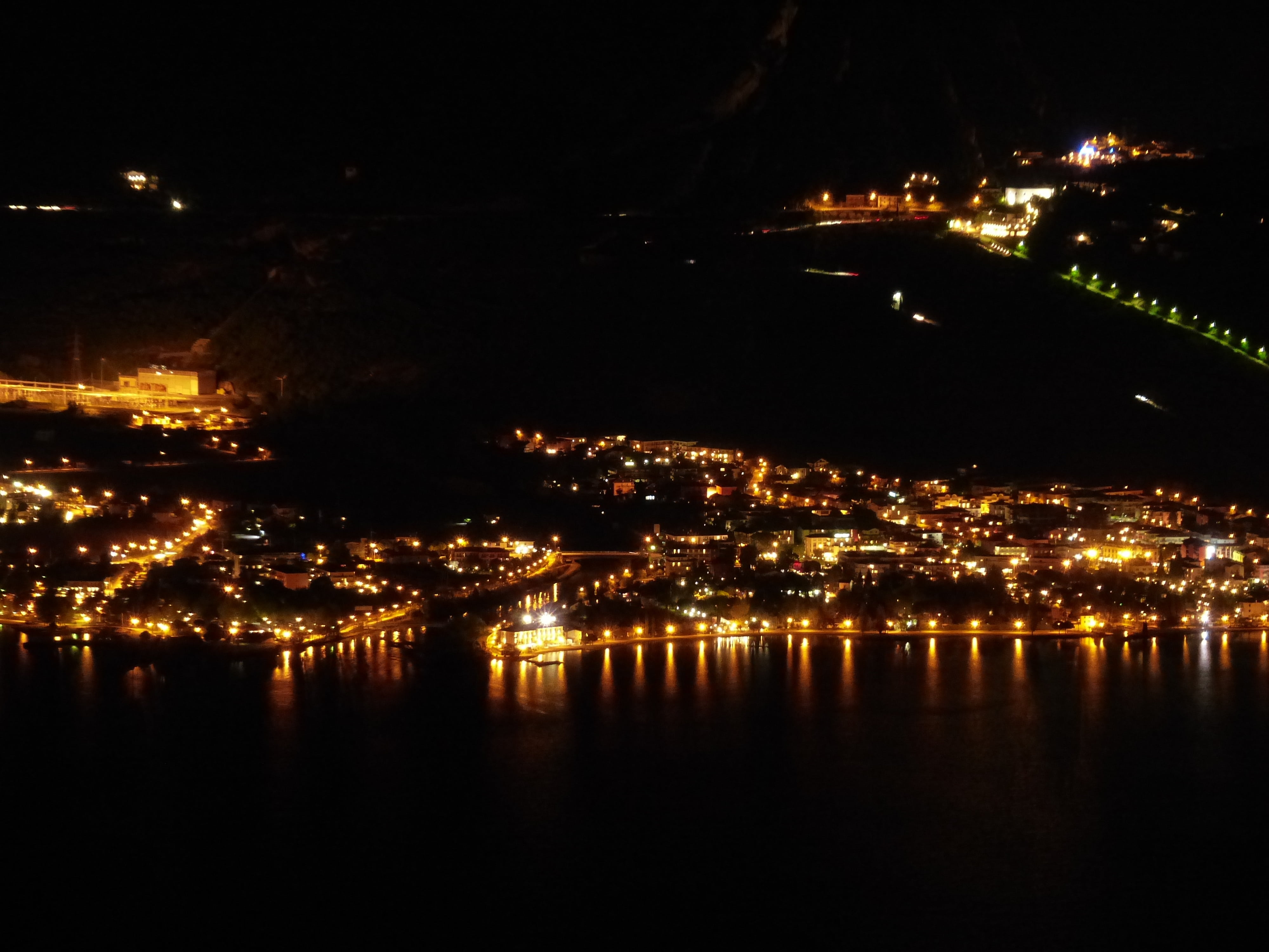water, sarca, torbole, river, night, light, no people, coast line, nature, built structure, city, cityscape, architecture, residential district, illuminated, HD Wallpaper