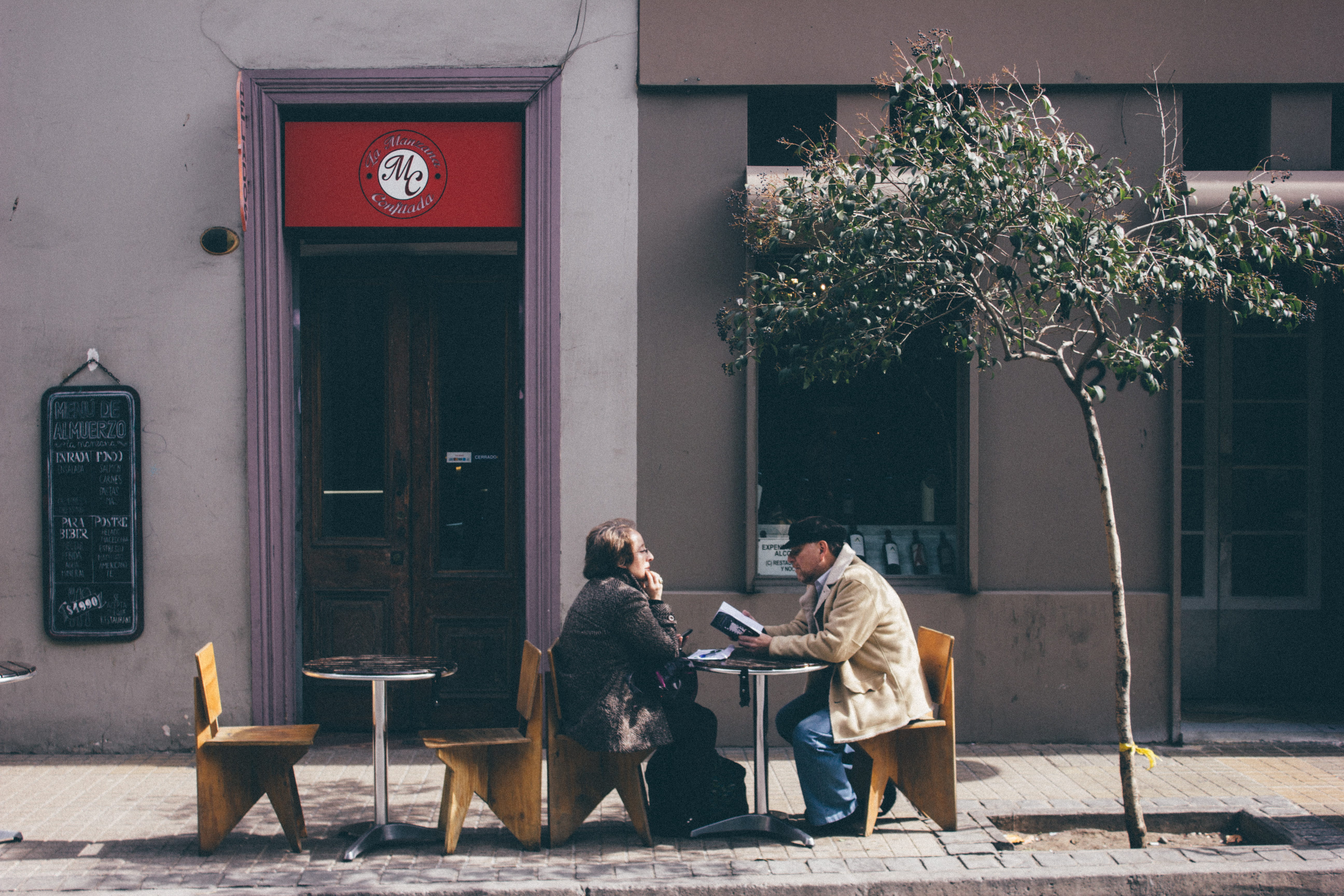 two people, coffee shop, technology, day, young adult, book, entrance, tree, door, barrio lastarria, architecture, full length, couple - relationship, leisure activity, HD Wallpaper
