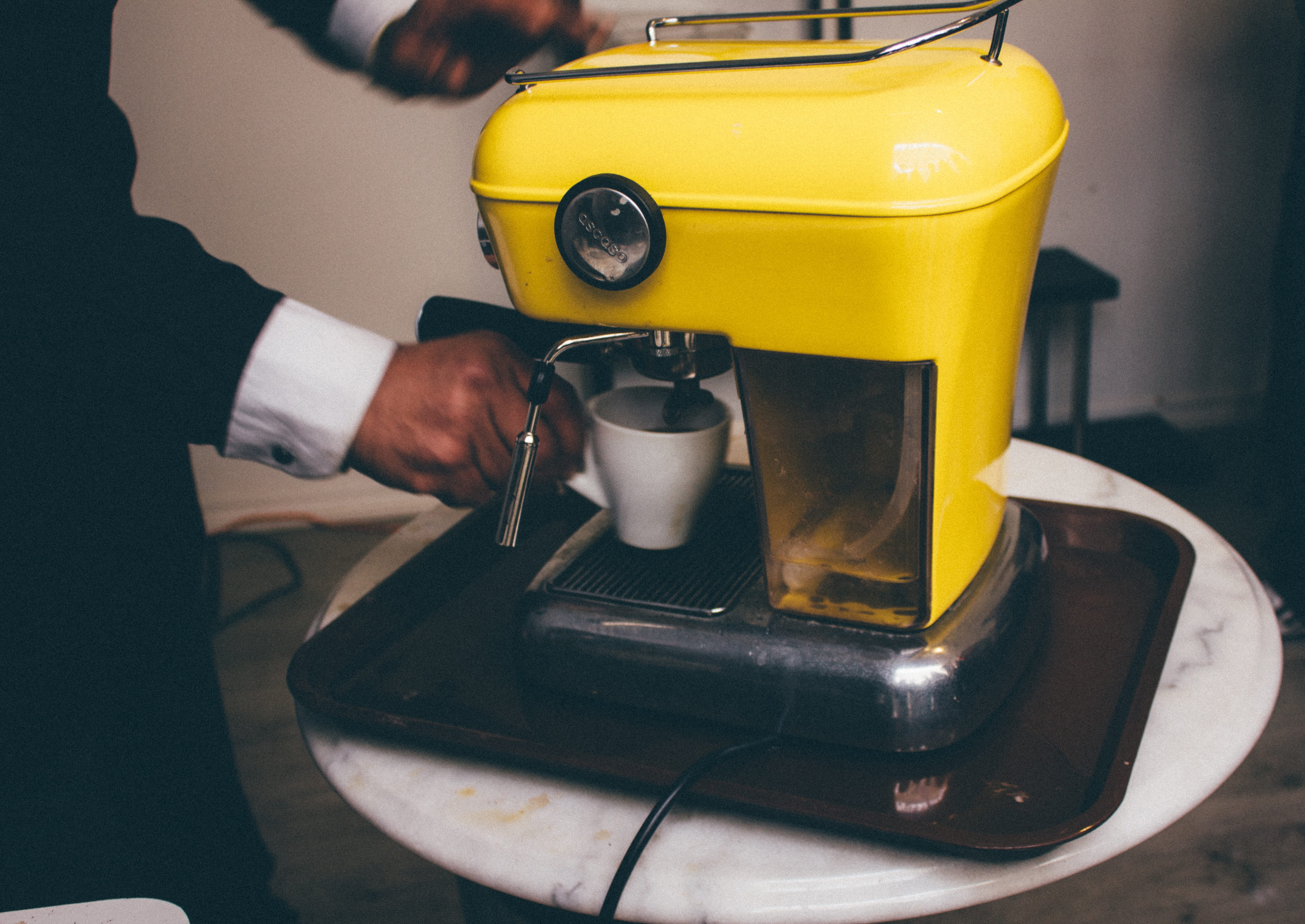 santiago, indoors, yellow, cup, body part, finger, human hand, focus on foreground, 4K, coffee - drink, technology, chile, hand, table, barrio italia, HD Wallpaper