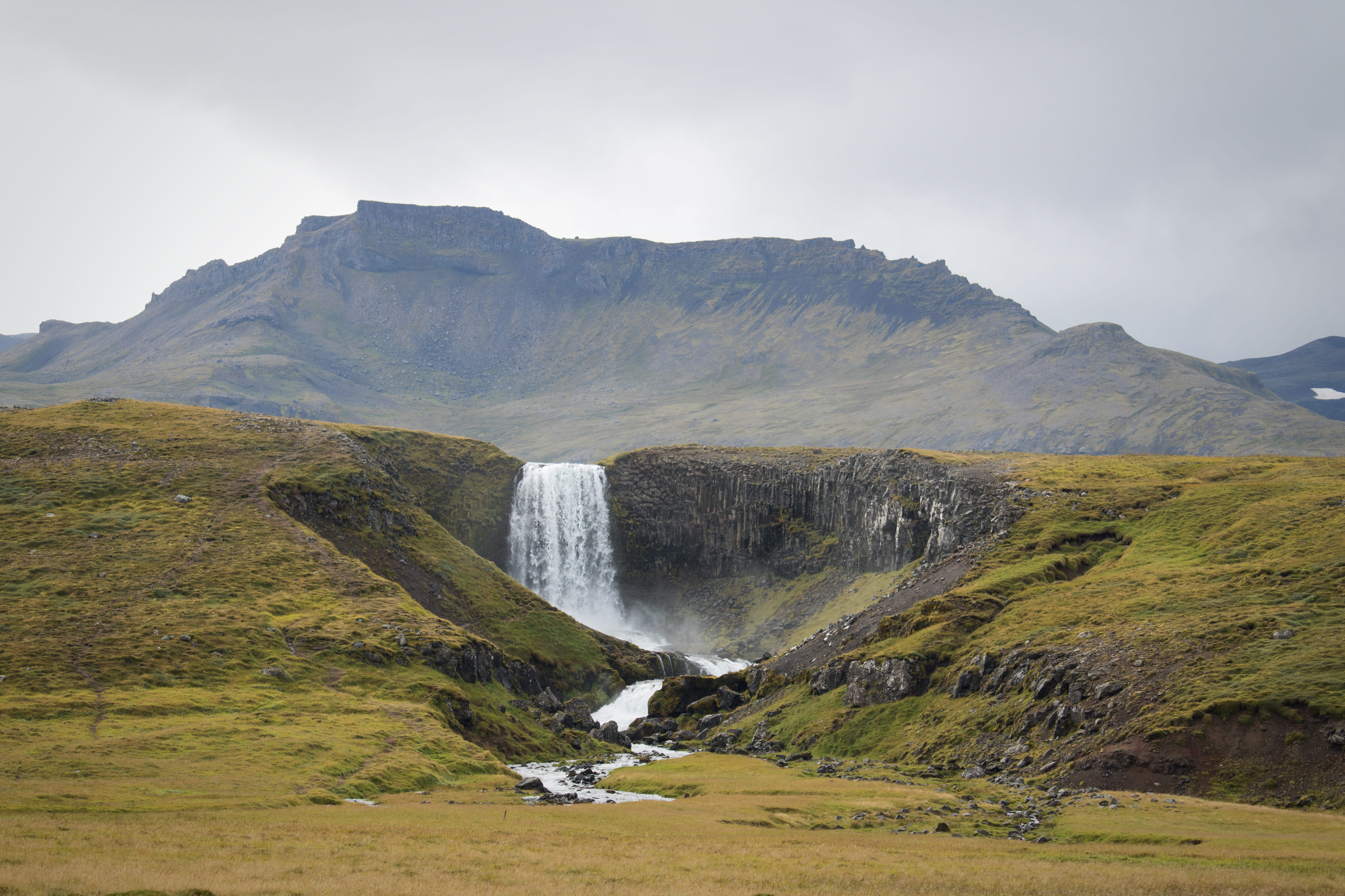 hills, waterfall, sky, mountain, no people, landscape, waterfalls, nature, gushing, cloud - sky, falls, beauty in nature, plateau, cliff, environment, outdoors, HD Wallpaper