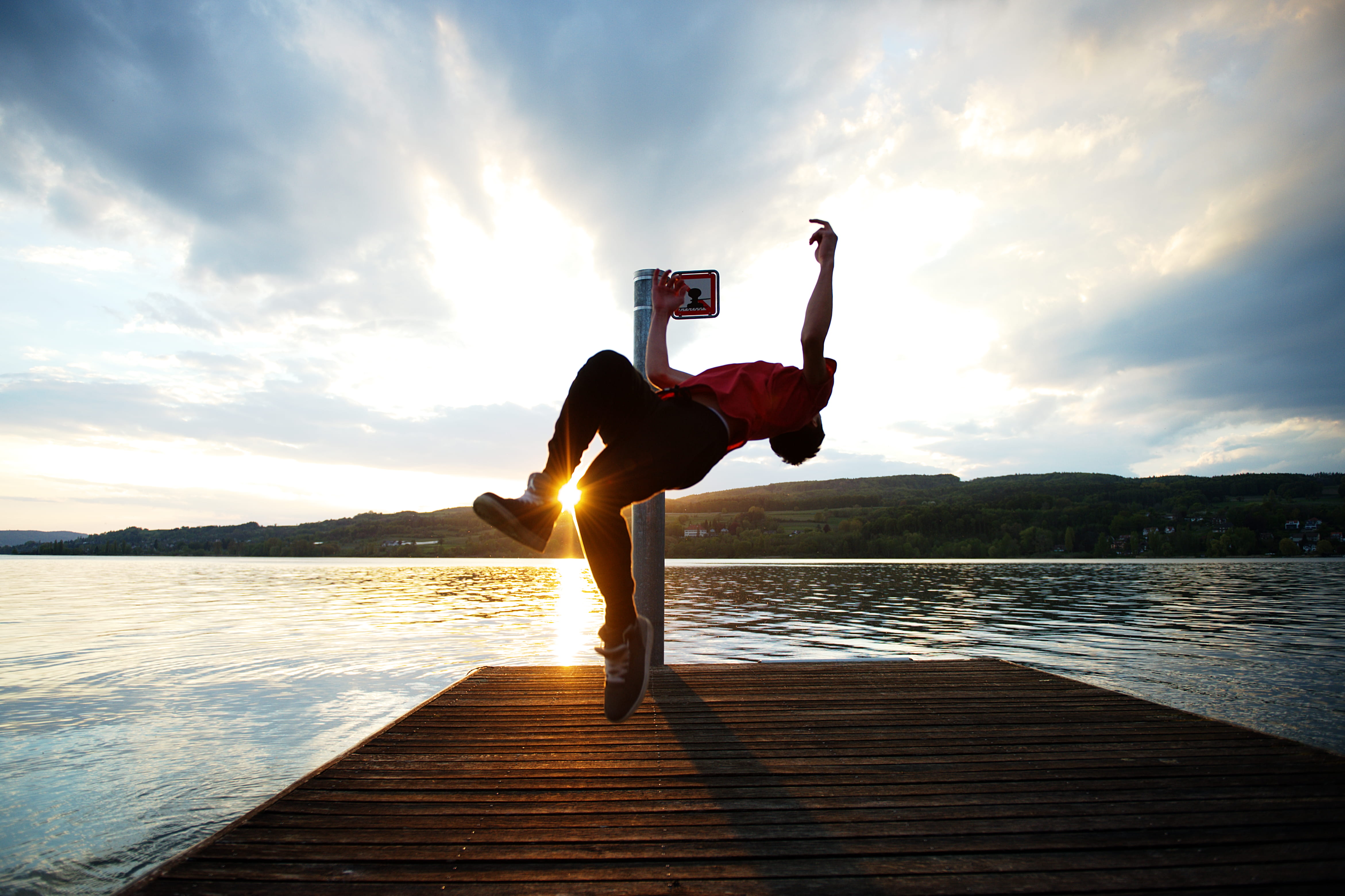 lens flare, sun, cloud - sky, lifestyles, human arm, sunset, sunlight, switzerland, wideangle, leisure activity, arms raised, pier, clouds, water, one person, HD Wallpaper