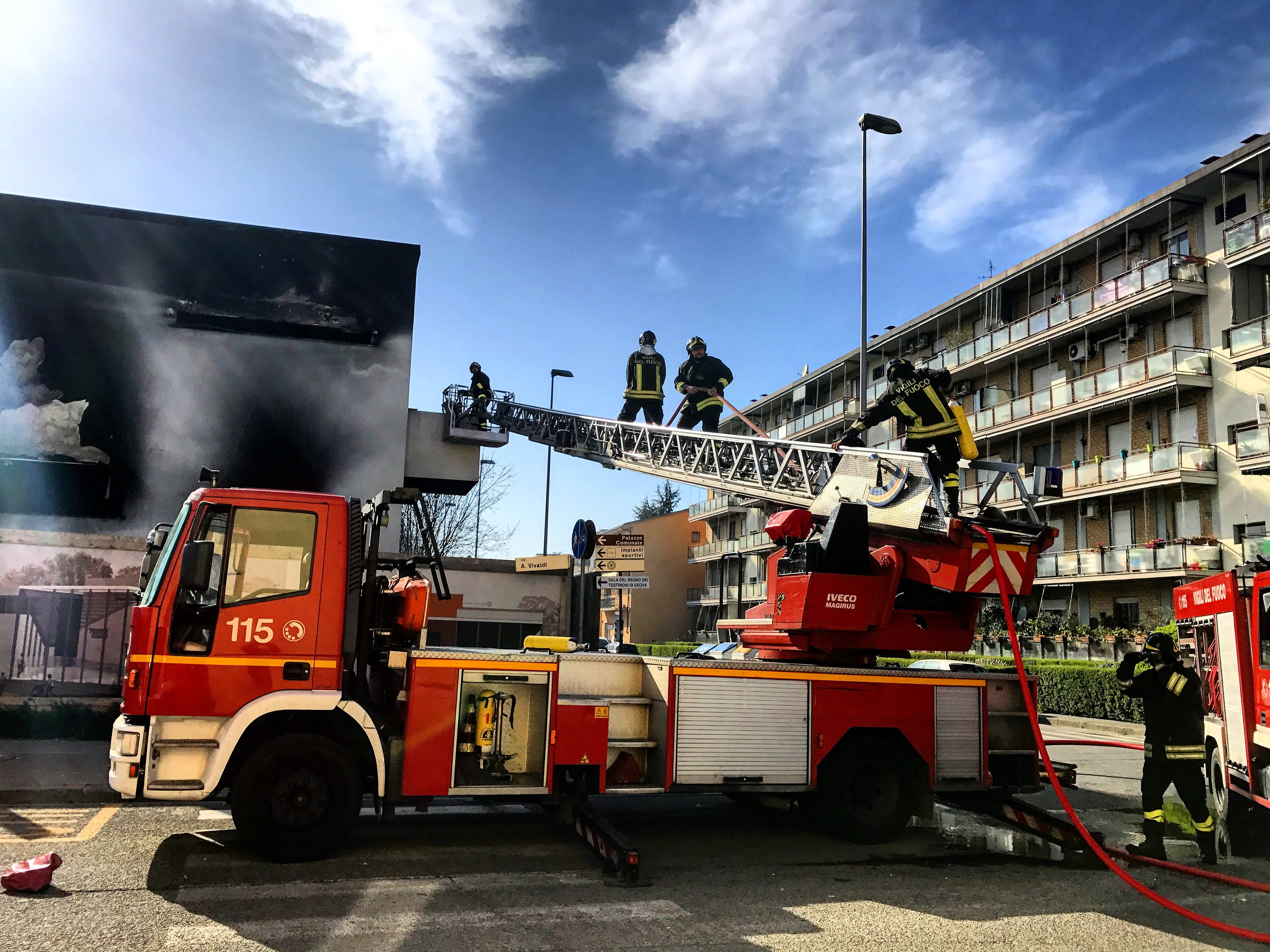 land vehicle, truck, building, city, accidents and disasters, firemen, autoscala, day, architecture, firetruck, 4K, responsibility, near, built structure, HD Wallpaper