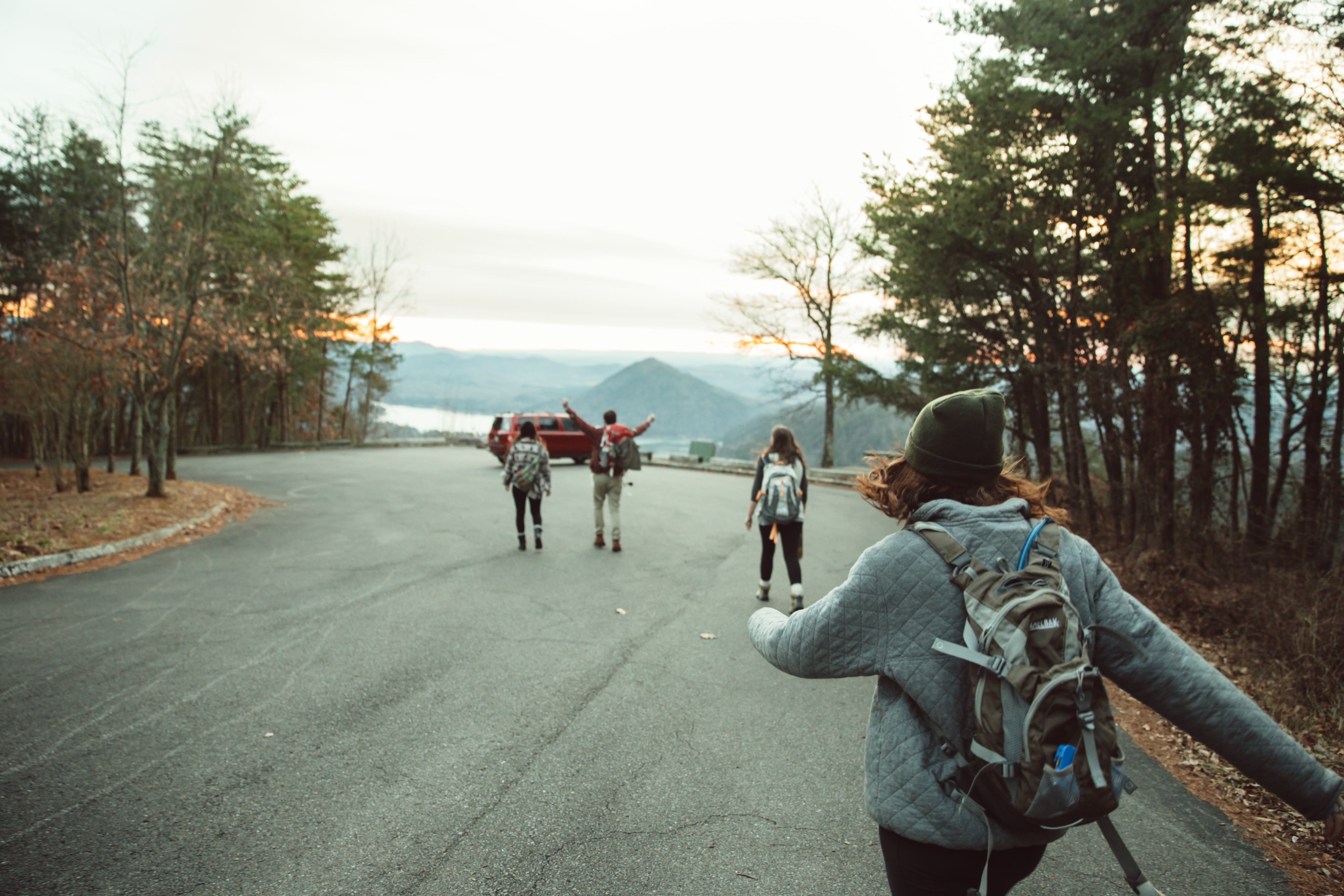 walking, men, young adult, direction, backpack, pavement, one, people, sky, woods, girl, three, lifestyles, warm clothing, man, transportation, red, towards, HD Wallpaper