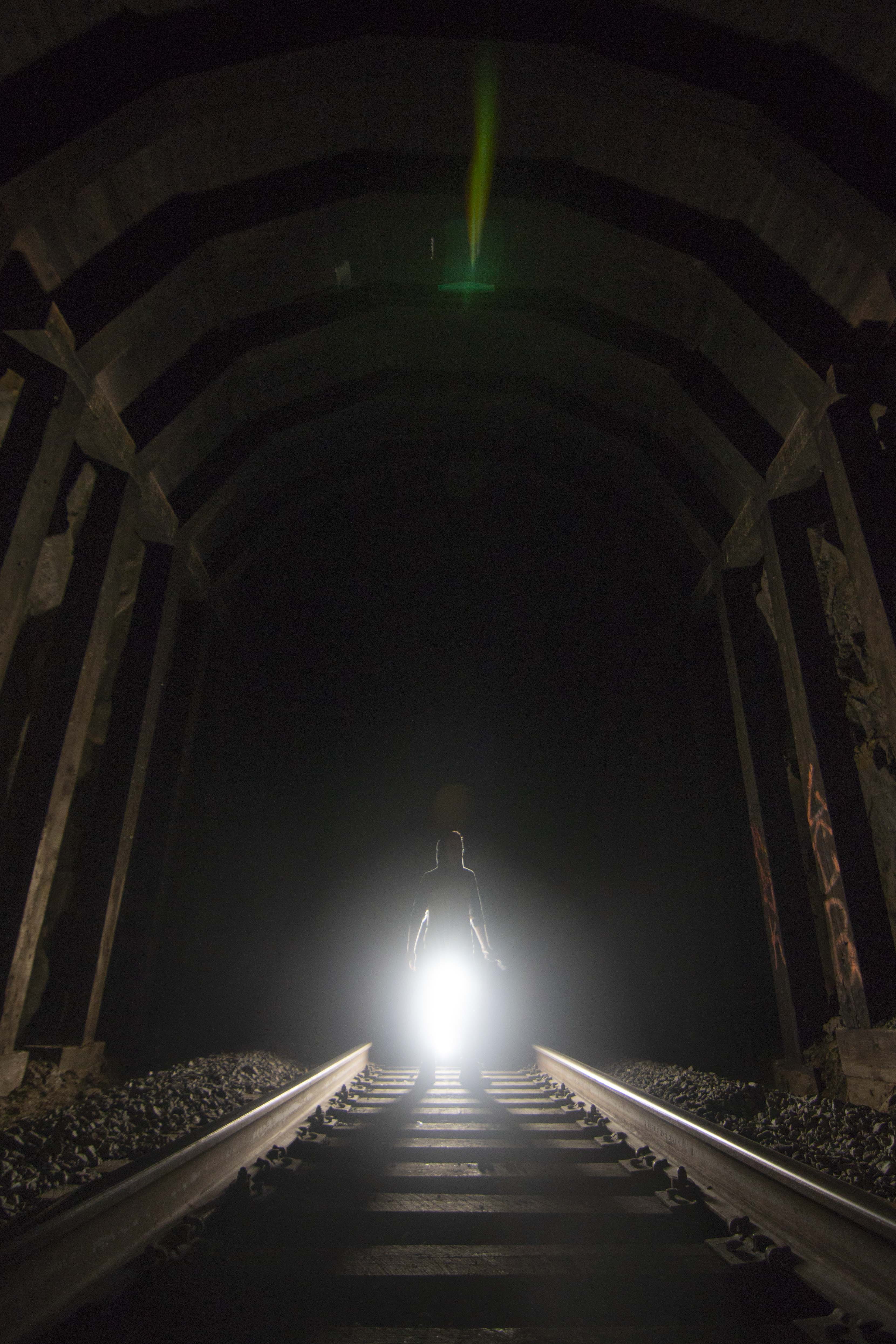 illuminated, the way forward, indoors, ambient, built structure, tracks, light, united states, real people, long exposure, tunnel, lighting equipment, lifestyles, Phone HD Wallpaper