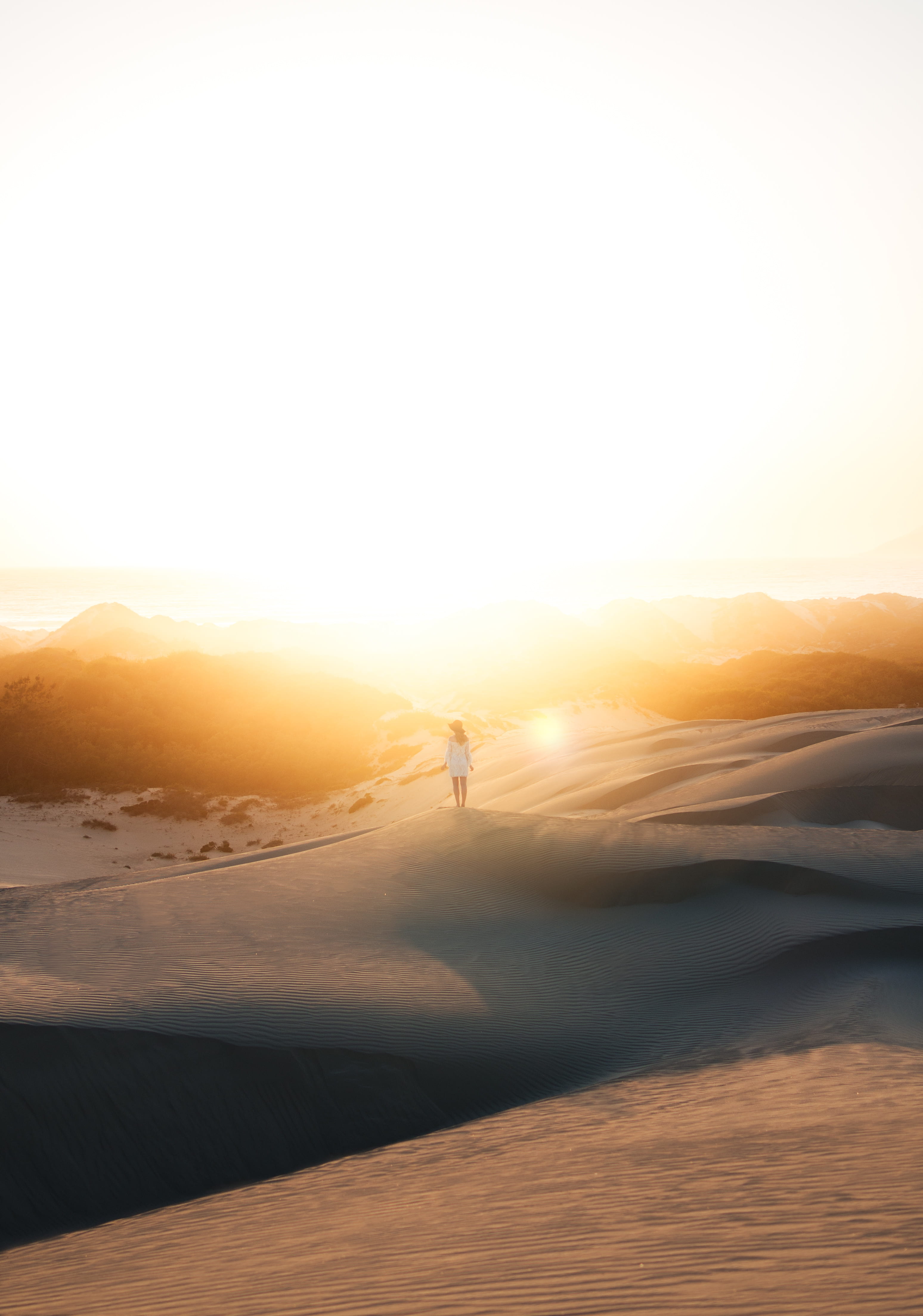 leisure activity, sunset, photo, sky, person, sand, unrecognizable person, hat, real people, glow, white dress, desert, lady, land, shadow, cold temperature, Phone HD Wallpaper