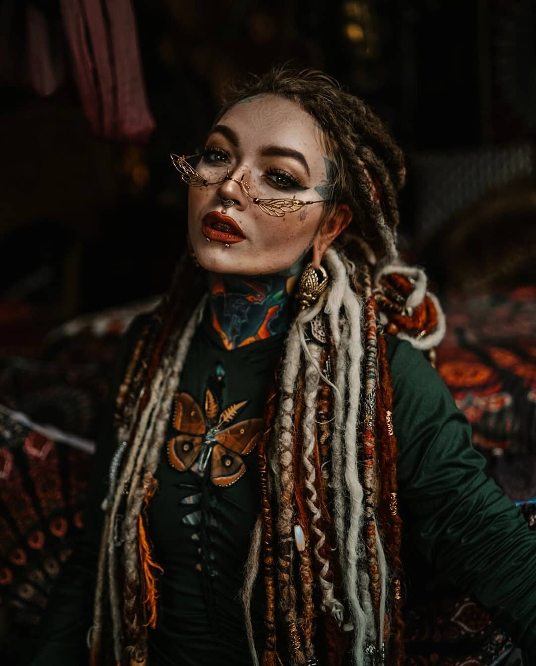720P, vertical, women indoors, lipstick, eyelashes, Stretched ears, bokeh, glasses, young woman, dark background, Pierced Lips, tattoo, natural light, Phone HD Wallpaper