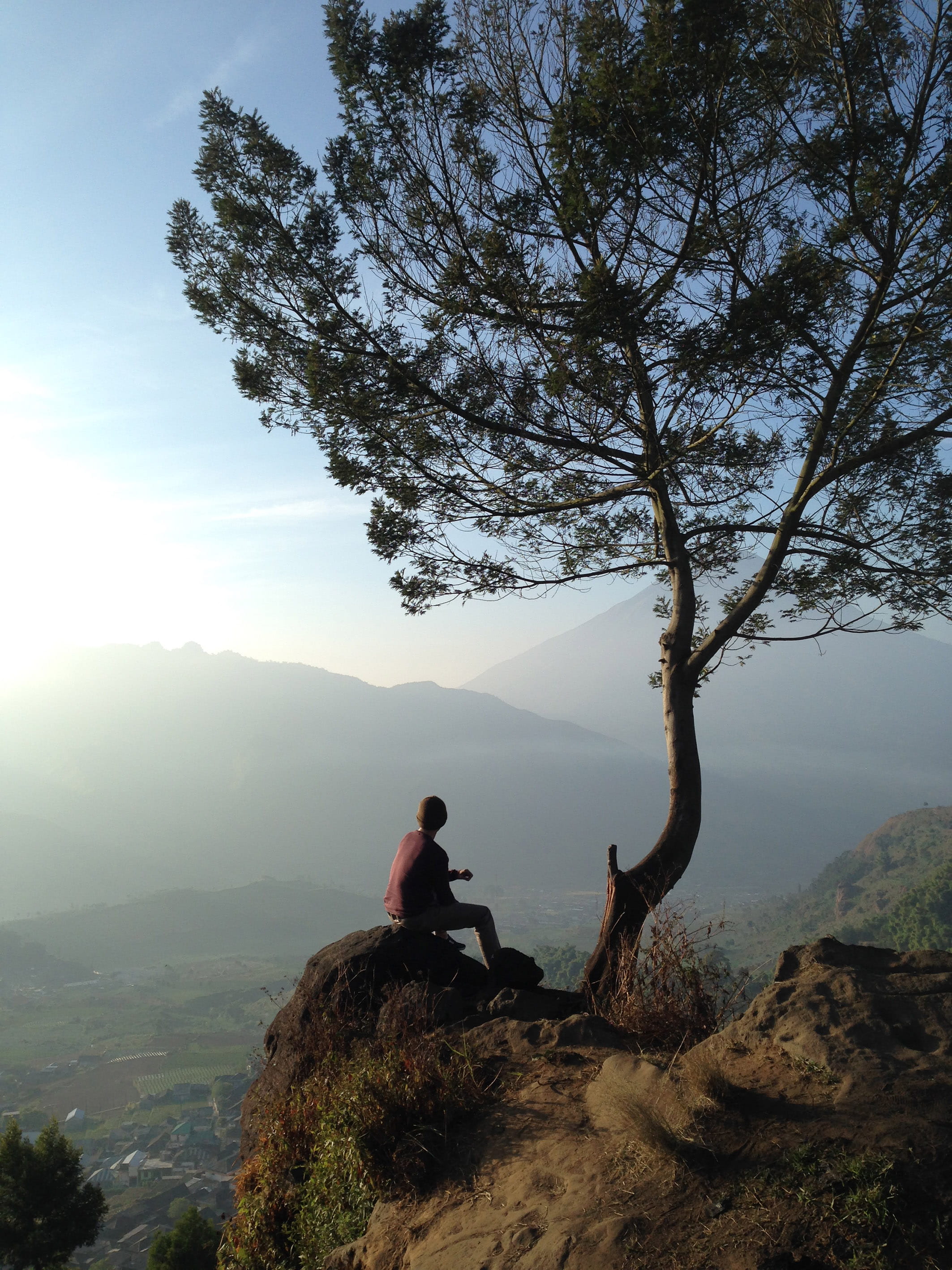 sitting, real people, men, dieng, scenics - nature, sky, rock - object, lifestyles, nature, one person, jawa tengah, environment, plant, tranquil scene, Phone HD Wallpaper