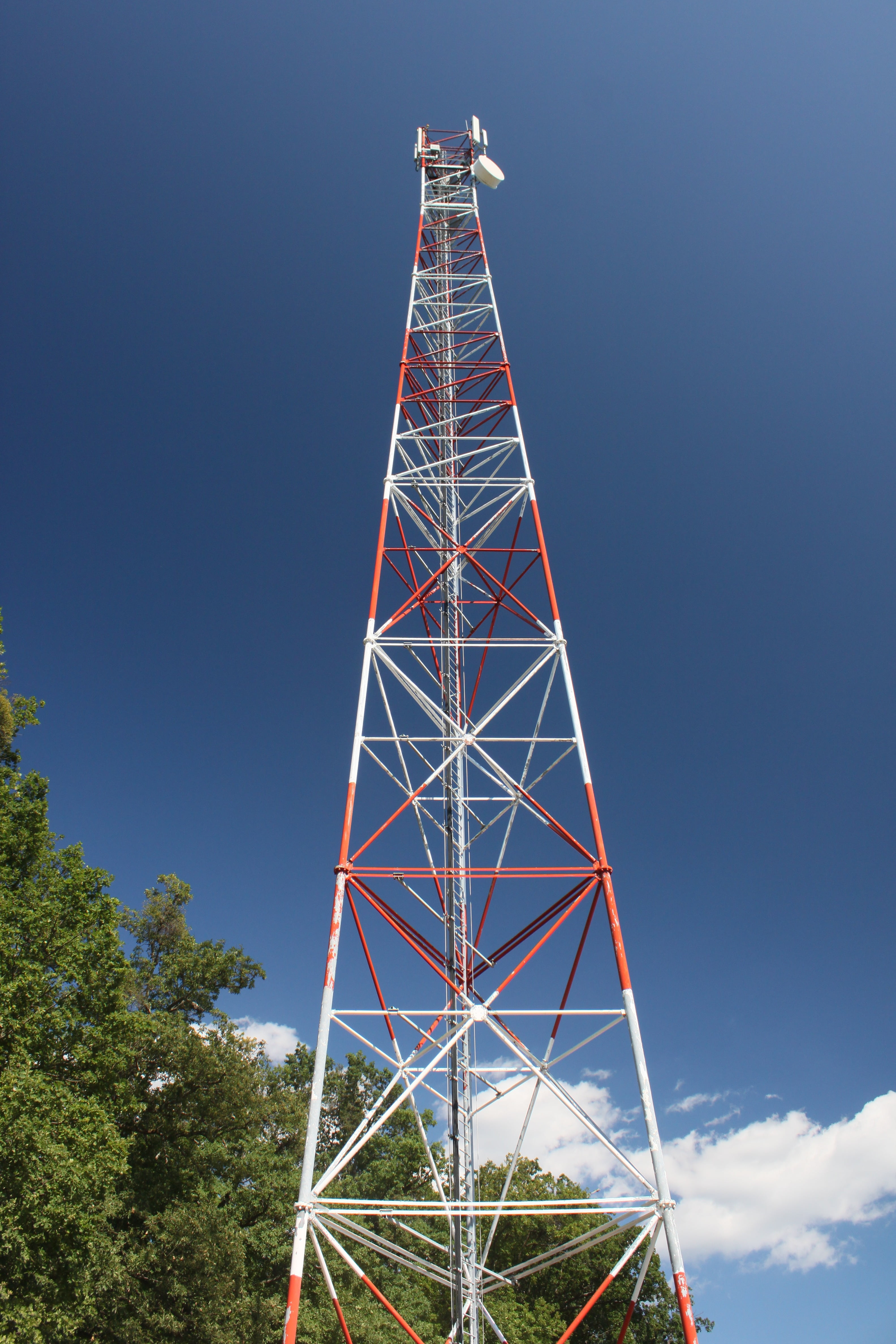 clouds, outdoors, red, metal, tree, radiation, sky, communication, 4K, phone, built structure, tall - high, telecom, plant, cellular, blue, cell, no people, Phone HD Wallpaper