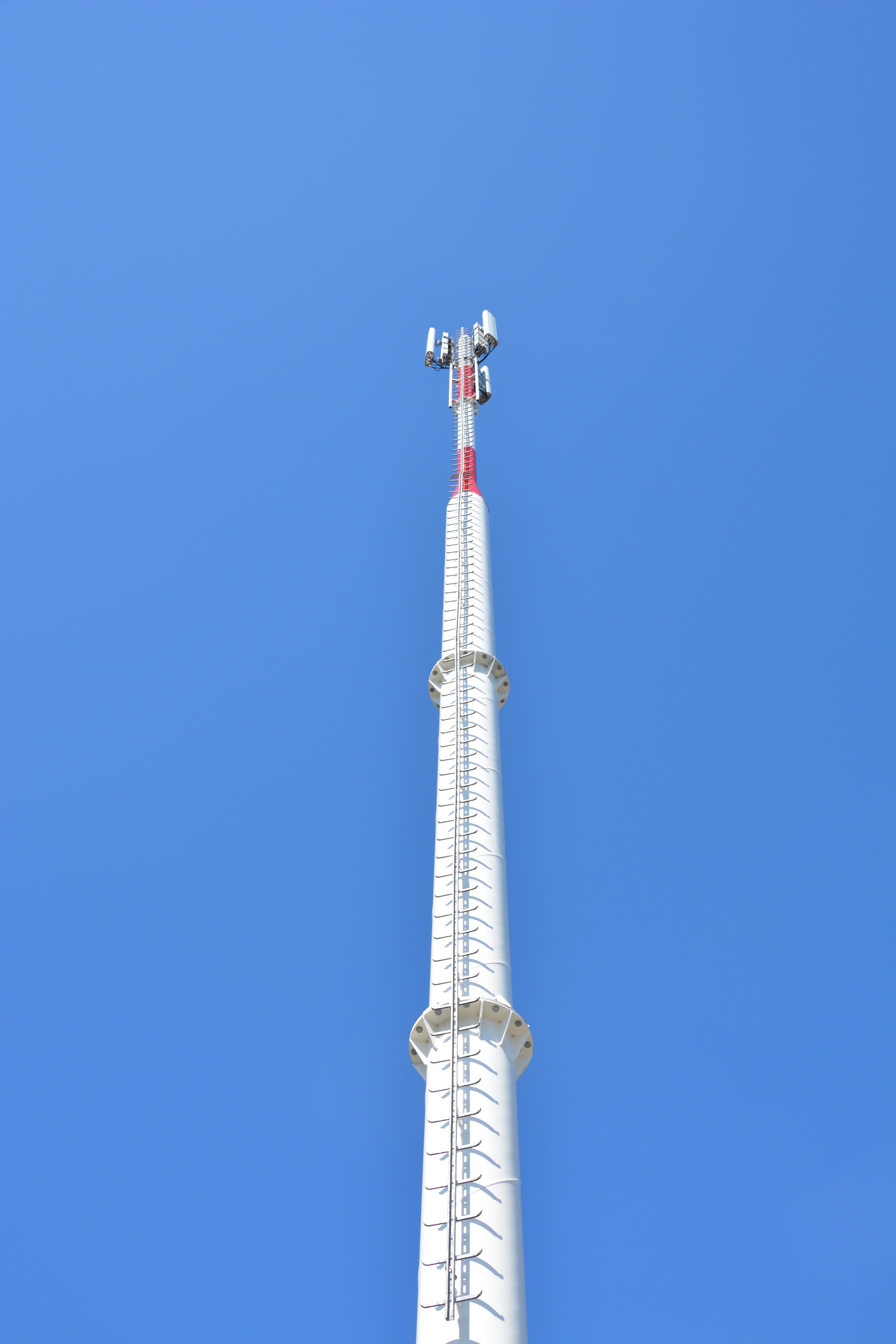 mast, silver colored, sunny, clear sky, communication, broadcasting, blue, cell tower, no people, low angle view, architecture, 4g, the cellular network, Phone HD Wallpaper