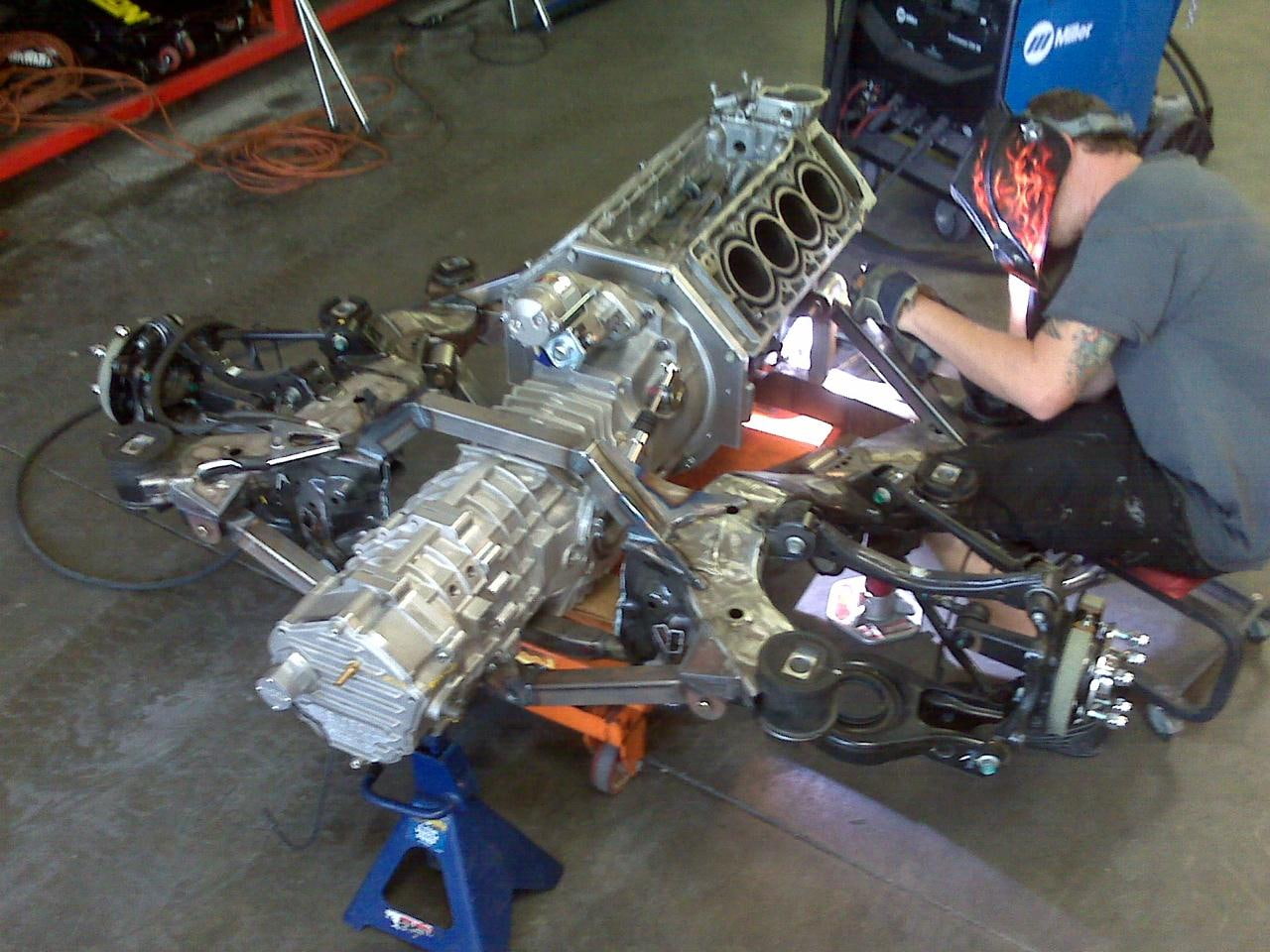 mechanic, holding, racing, occupation, auto repair shop, men, workshop, miller, machinery, coupe, adult, car, 720P, technician, working, rm, hyundai, metal, HD Wallpaper