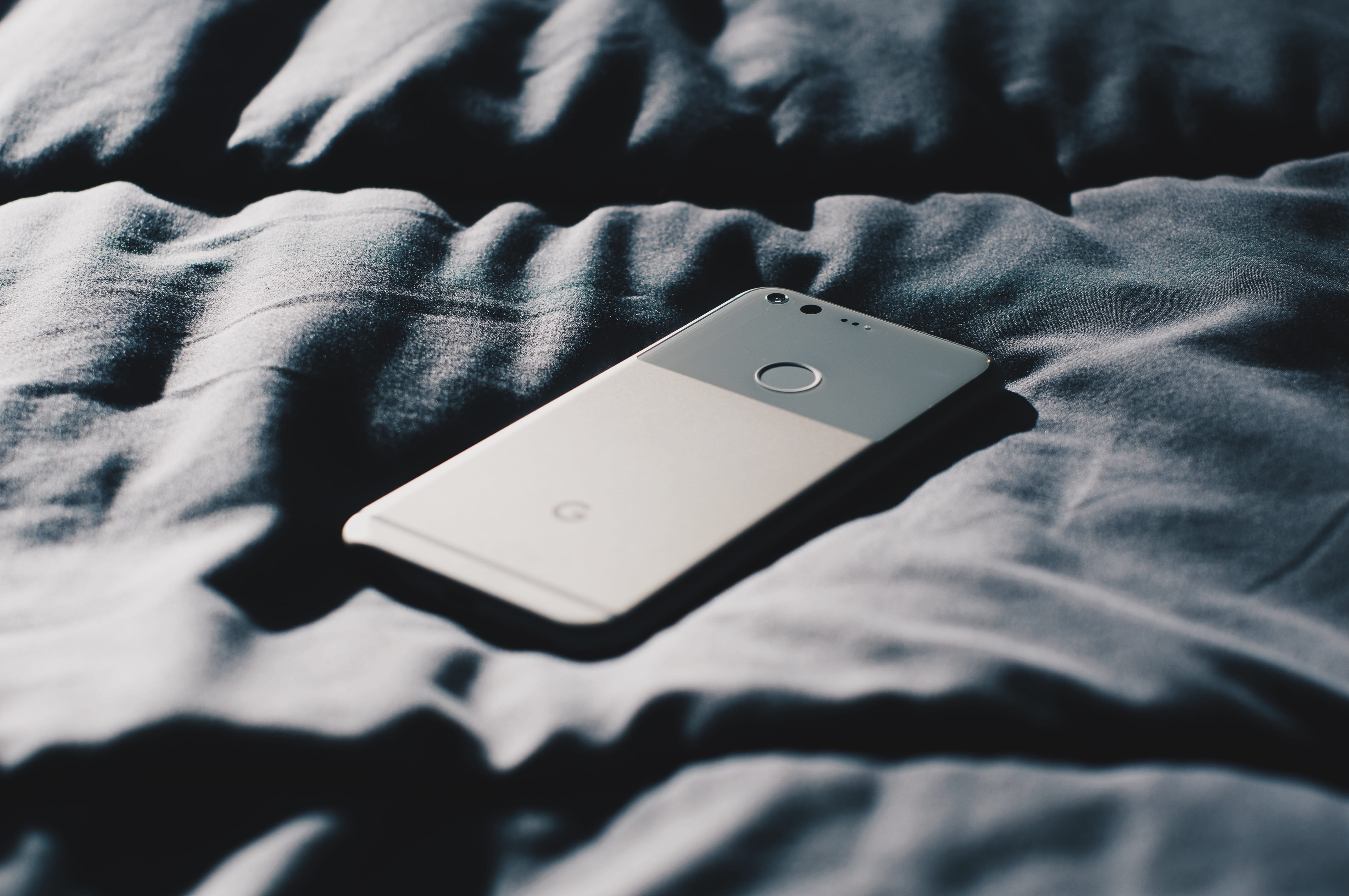 human hand, hand, smartphone, textile, grey, high angle view, arts culture and entertainment, electronic, jeans, furniture, bed, key, button, midsection, HD Wallpaper