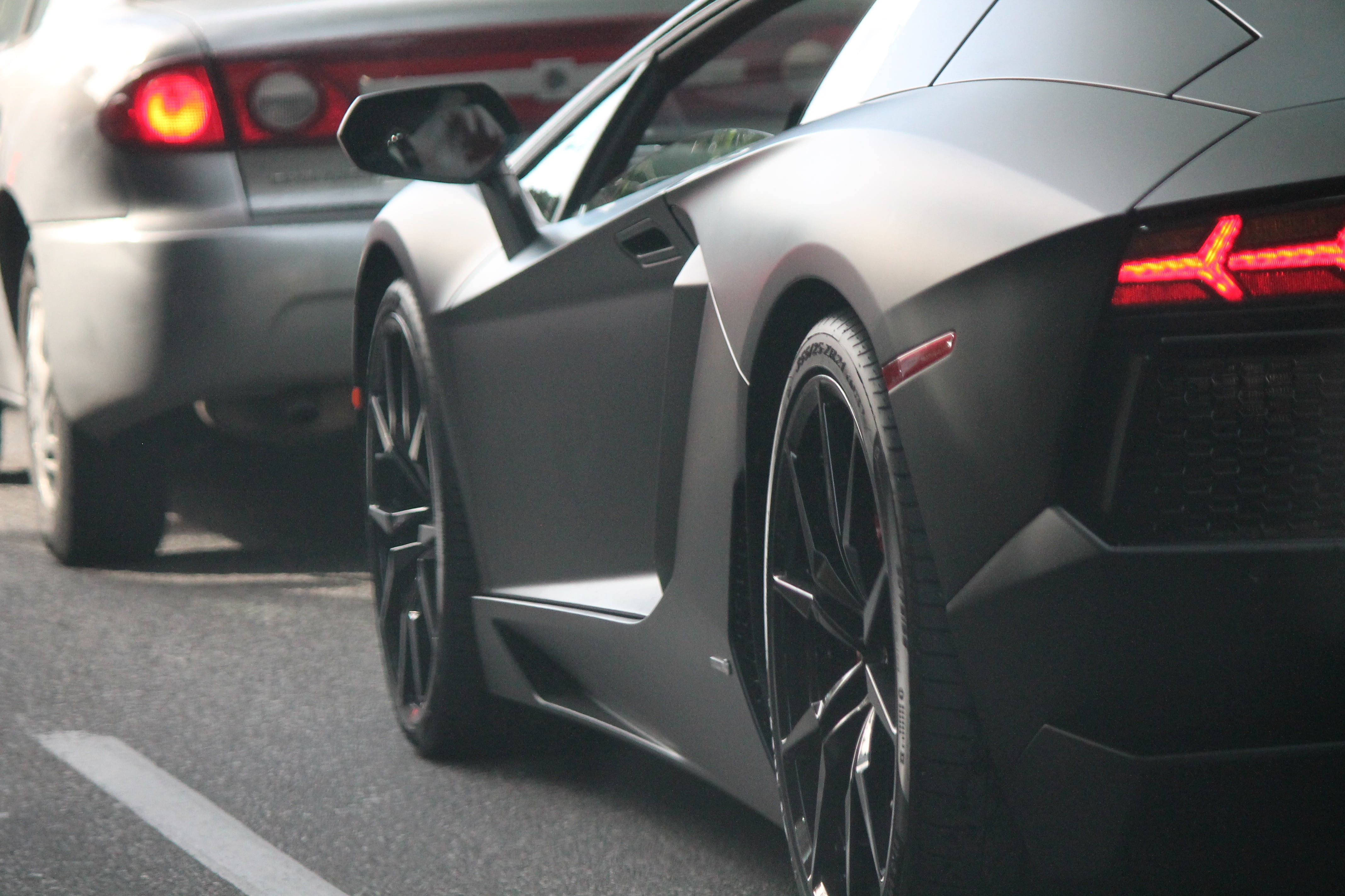 sign, new, land Vehicle, matte, rear view, day, traffic, no People, silver colored, 4K, speed, car, city, modern, wheel, transportation, lamborghini, parking Lot, HD Wallpaper
