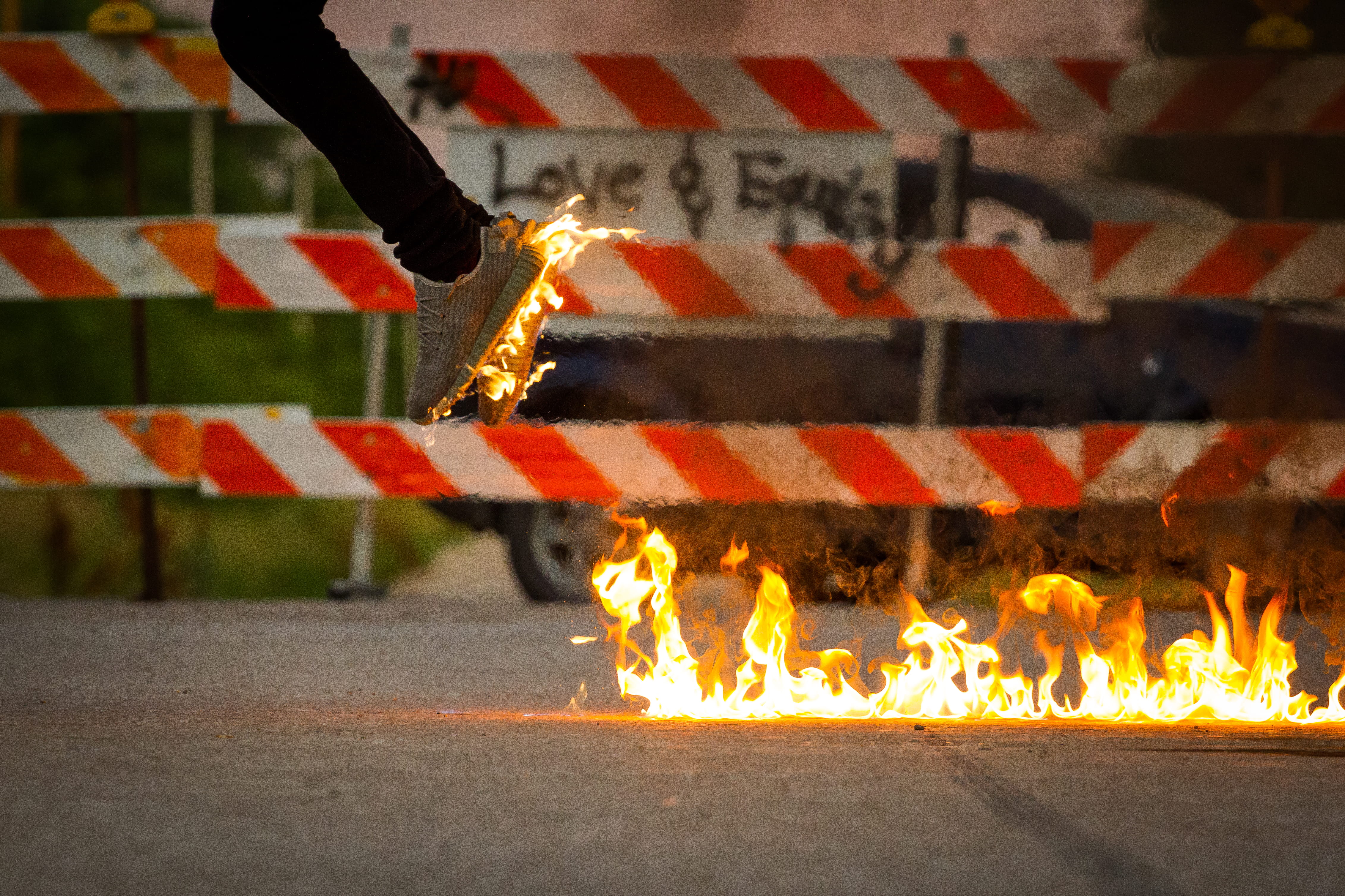 human hand, fire - natural phenomenon, one person, jumping, street, sign, adida, caution, danger, cool, barricade, nature, adventure, HD Wallpaper