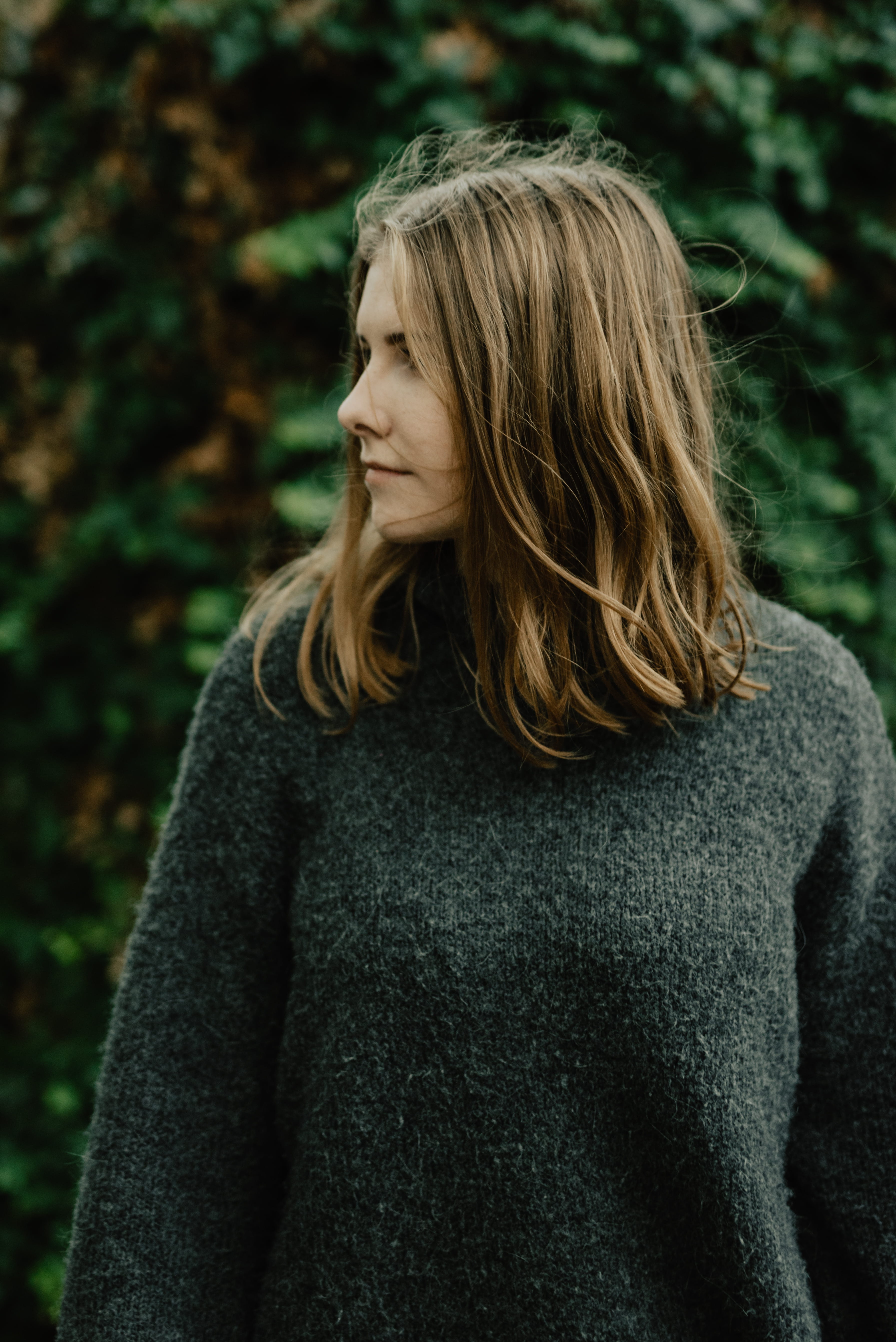 contemplation, looking, one person, long sleeve, hoodie, black, standing, person, turtleneck, photography, hairstyle, 5K, warm clothing, beautiful woman, Phone HD Wallpaper