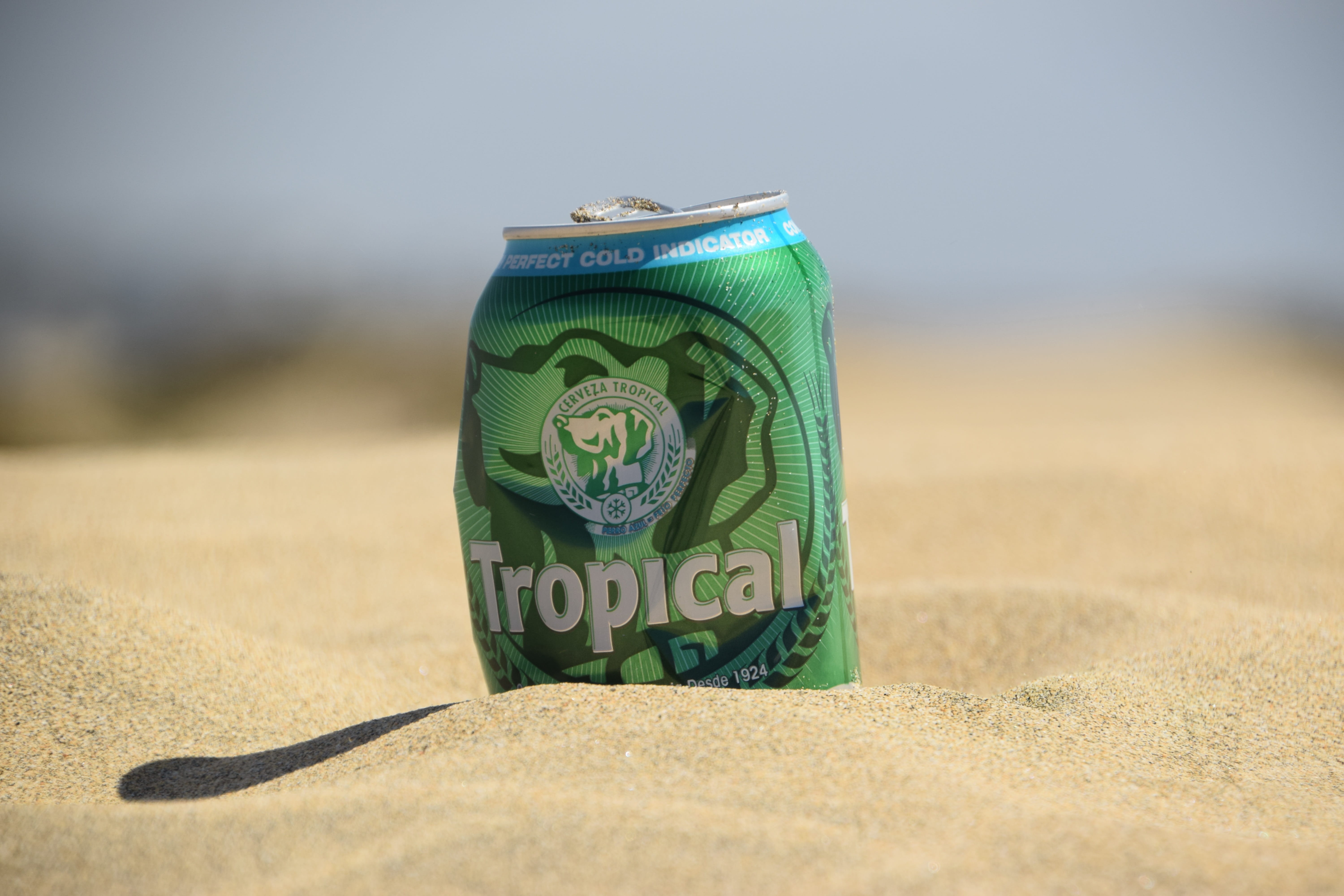 container, selective focus, sky, coast, gran canaria, dune, party, currency, beer can, nature, tropical, summer, human representation, alcohol, blue, no people, HD Wallpaper