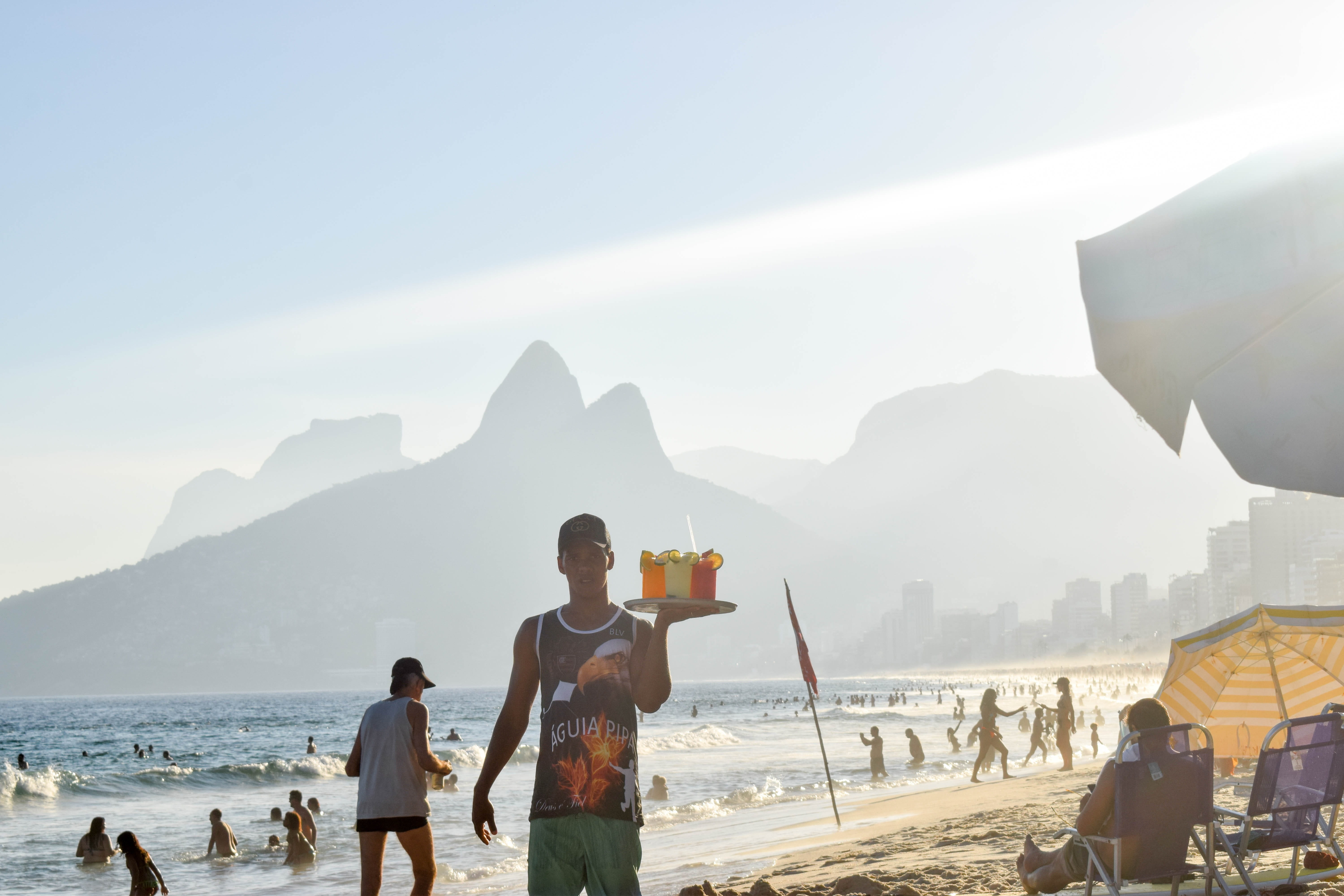 lifestyles, barman, sky, beach, adult, day, sea, summer, architecture, drink, mountain, vacation, mountain range, cocktails, real people, togetherness, HD Wallpaper