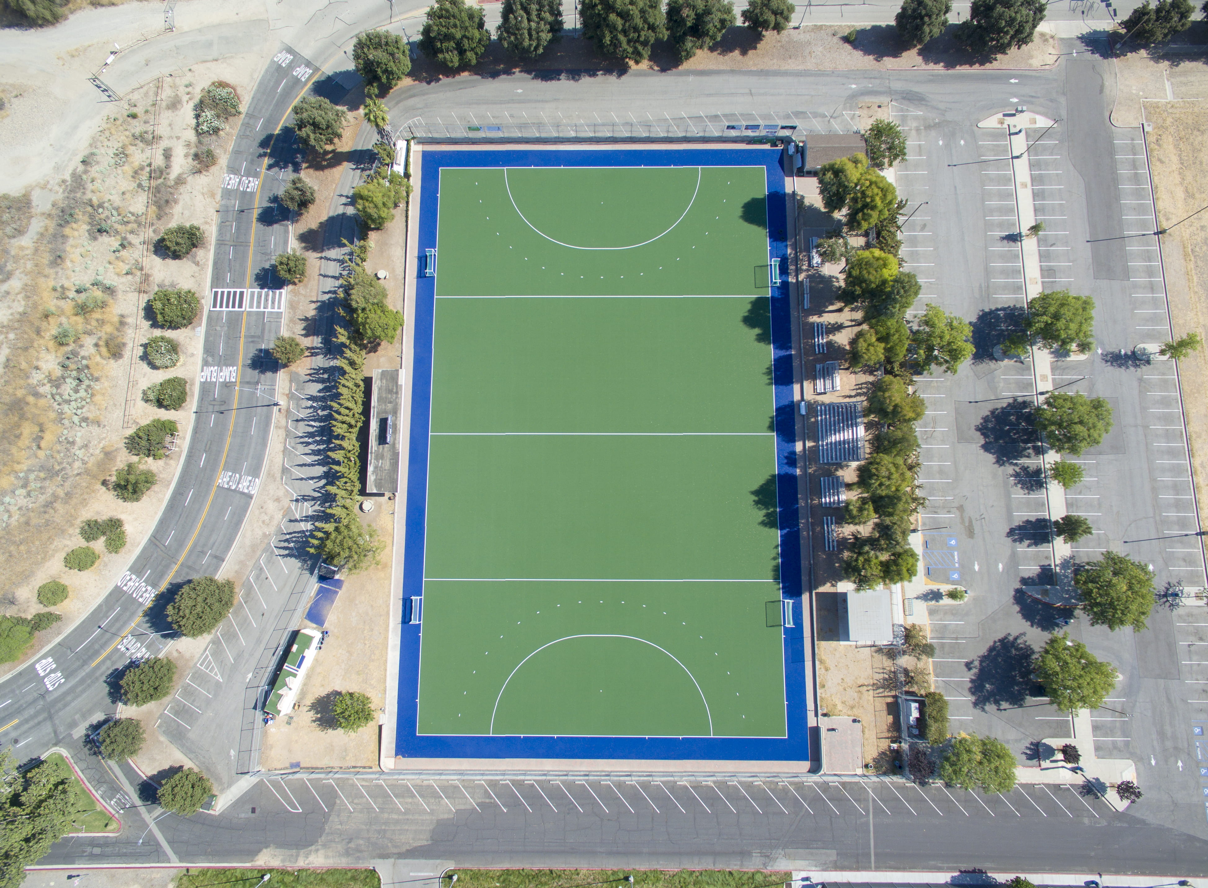 soccer, pitch, high angle view, no people, housing, outdoors, urban, city, angle, parking lot, united states, road, playing field, court, car park, nature, HD Wallpaper