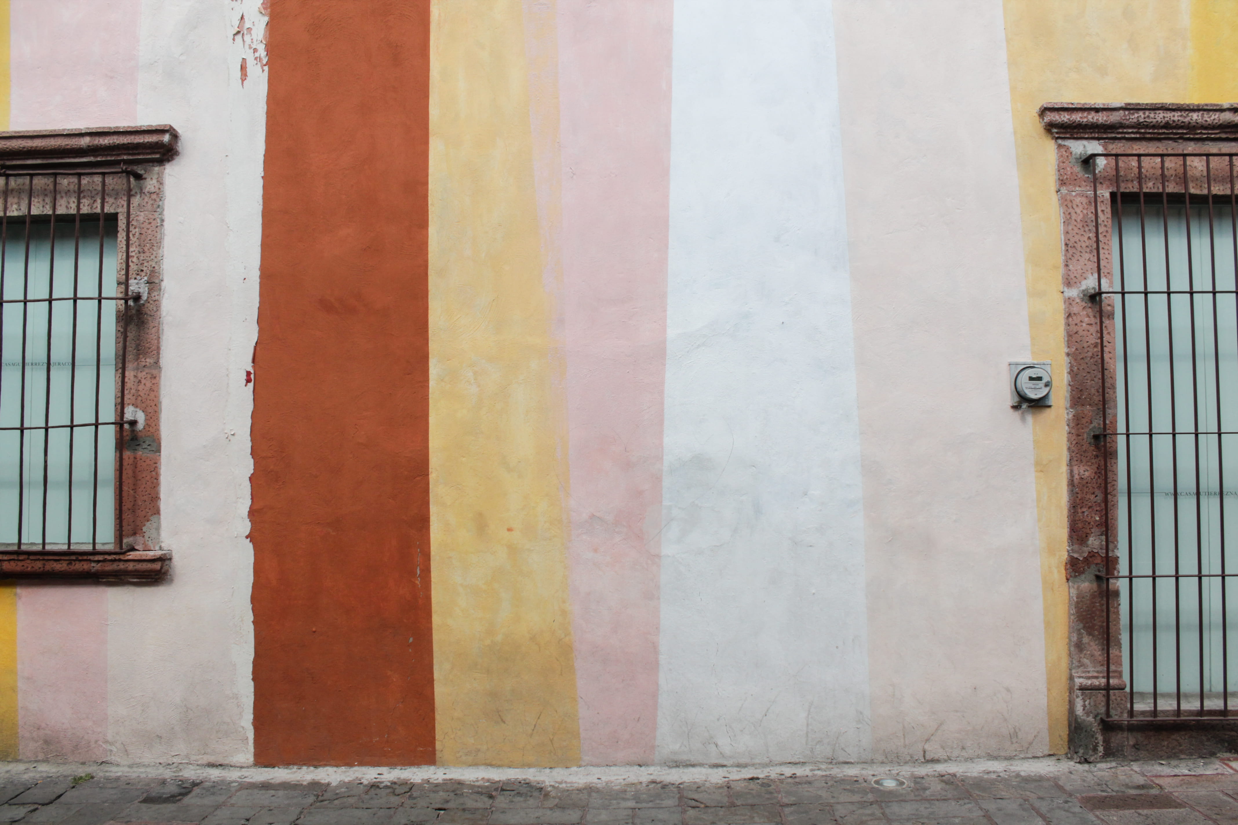 pavement, red, purple, striped, colorful wall, building exterior, paint, day, mexican, built structure, metal, yellow, window, security, architecture, closed, HD Wallpaper