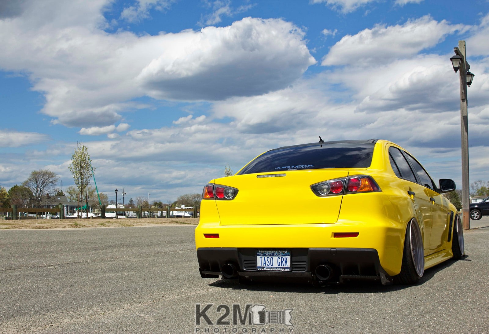 vehicle, outdoors, text, road, land vehicle, street, Mitsubishi Lancer Evo X, day, 720P, mode of transportation, sky, cloud - sky, Mitsubishi Lancer, no people, HD Wallpaper