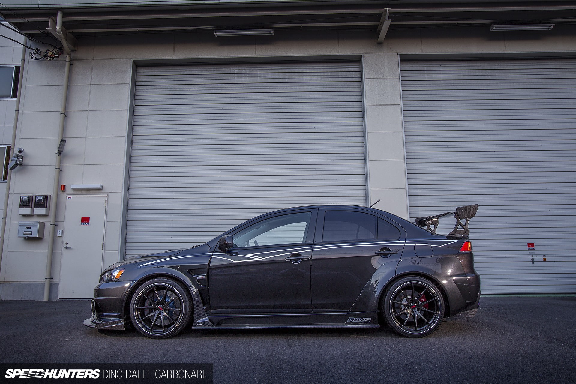 day, 1080P, Mitsubishi Lancer EVO, wheel, mitsubishi, protection, building exterior, built structure, rally, security, outdoors, metal, transportation, HD Wallpaper