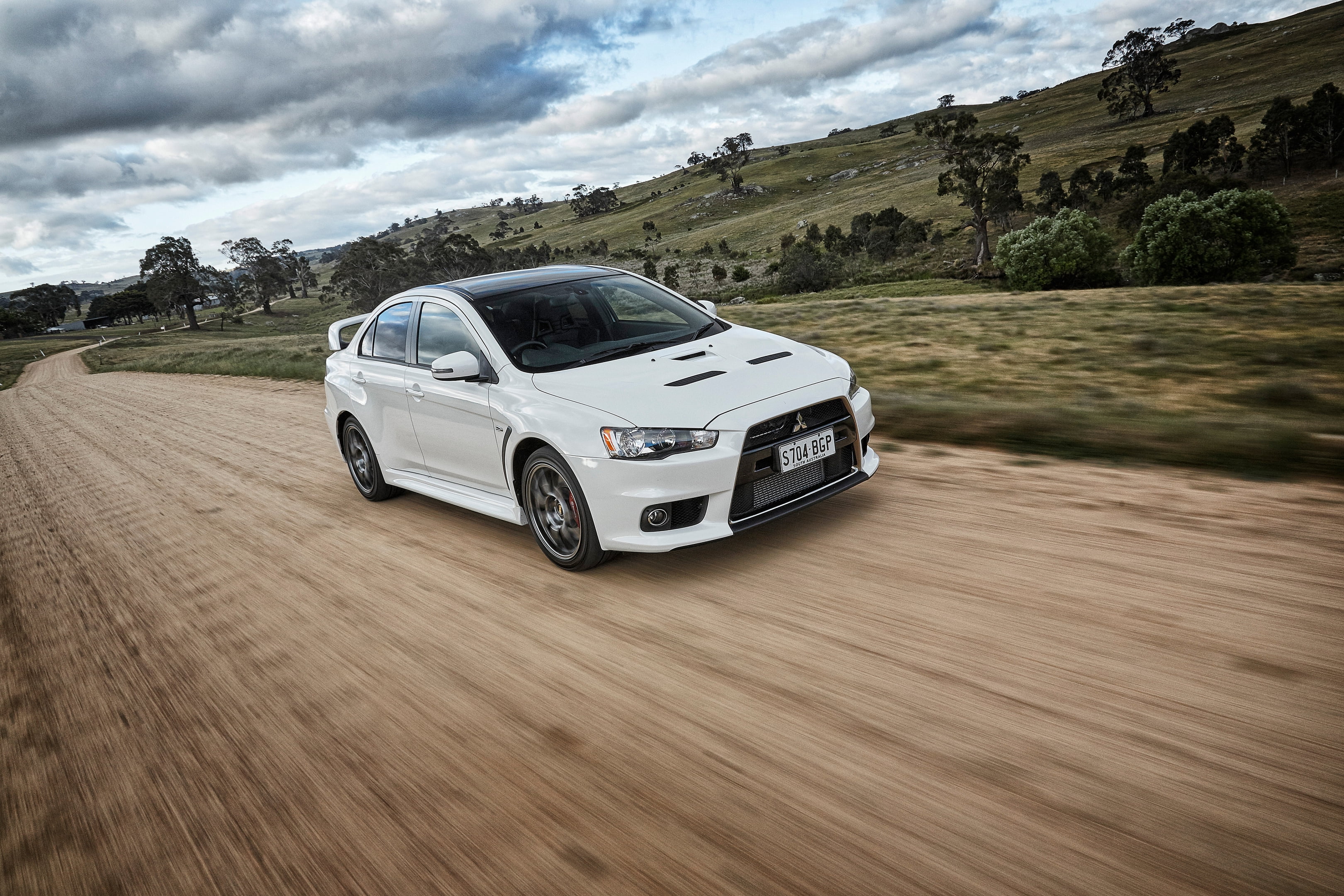 land, day, motor vehicle, sky, Mitsubishi, nature, mode of transportation, motion, cloud - sky, road, wheel, transportation, landscape, Evolution, car, HD Wallpaper
