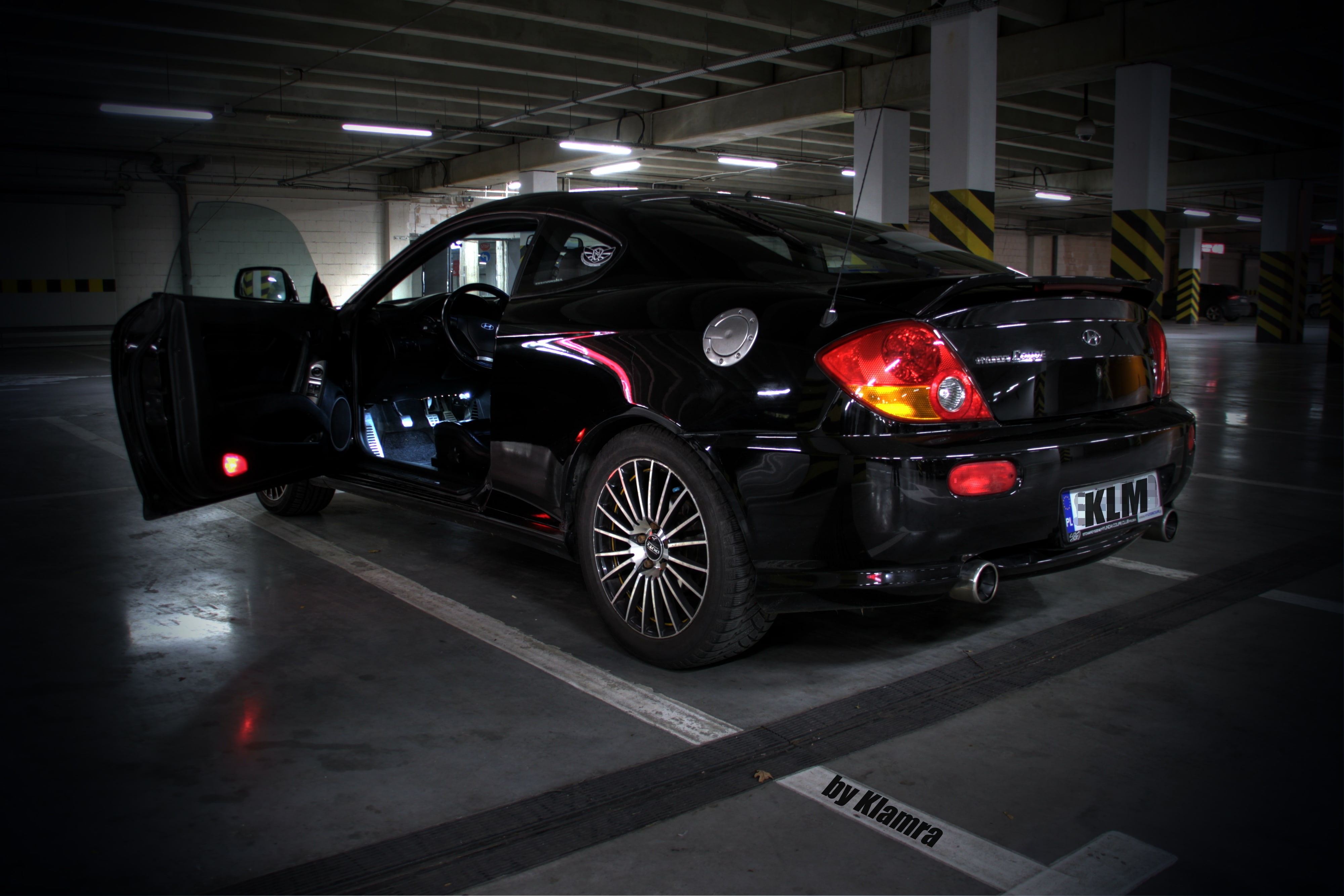 no people, black color, travel, coupe, sign, lighting equipment, architecture, 4K, garage, parking, illuminated, stationary, mode of transportation, indoors, HD Wallpaper