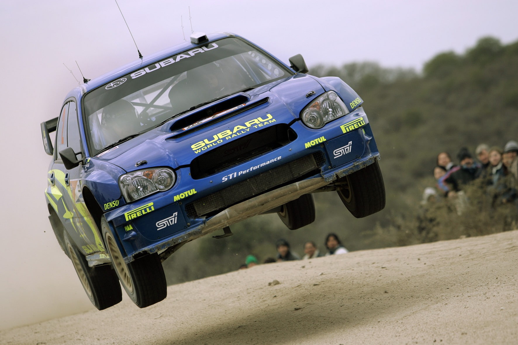 environment, competition, Subaru, people, flying, air vehicle, focus on foreground, road, wrc, day, incidental people, transportation, number, mode of transportation, HD Wallpaper