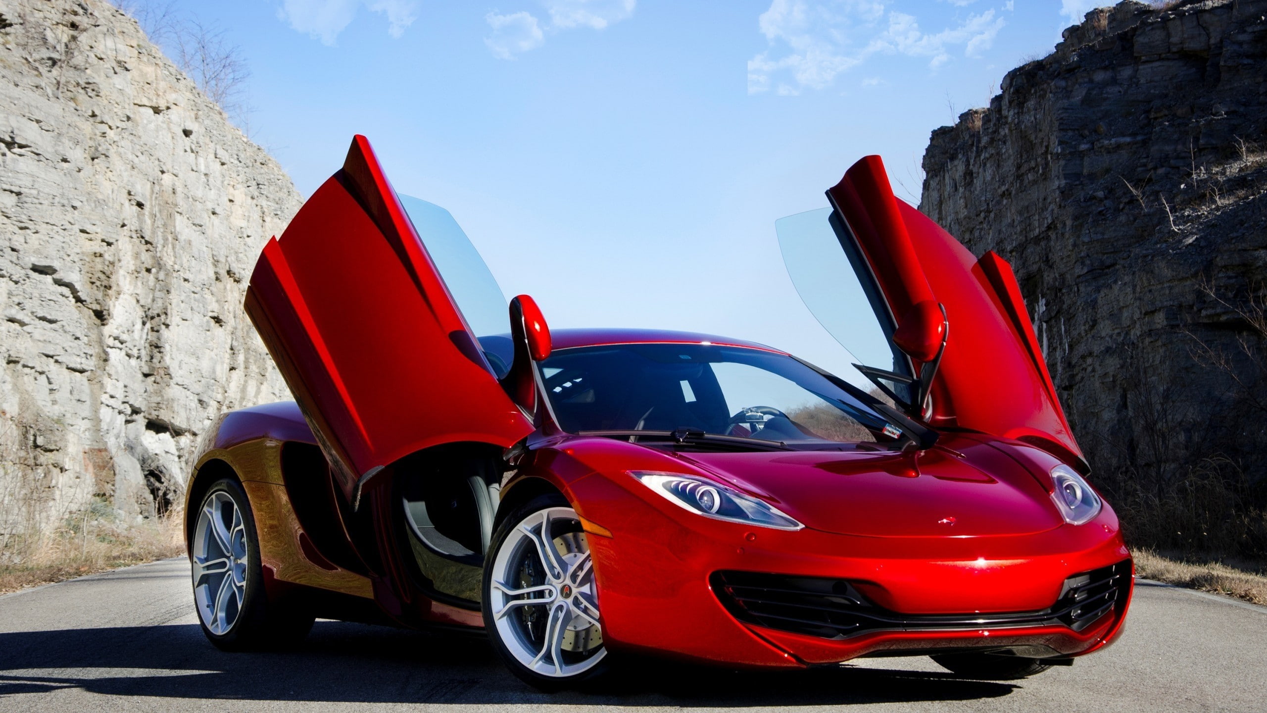 motor vehicle, racecar, MP4-12C, 2K, day, sunlight, outdoors, road, stationary, no people, travel, blue, McLaren, nature, luxury, land vehicle, sky, transportation, HD Wallpaper