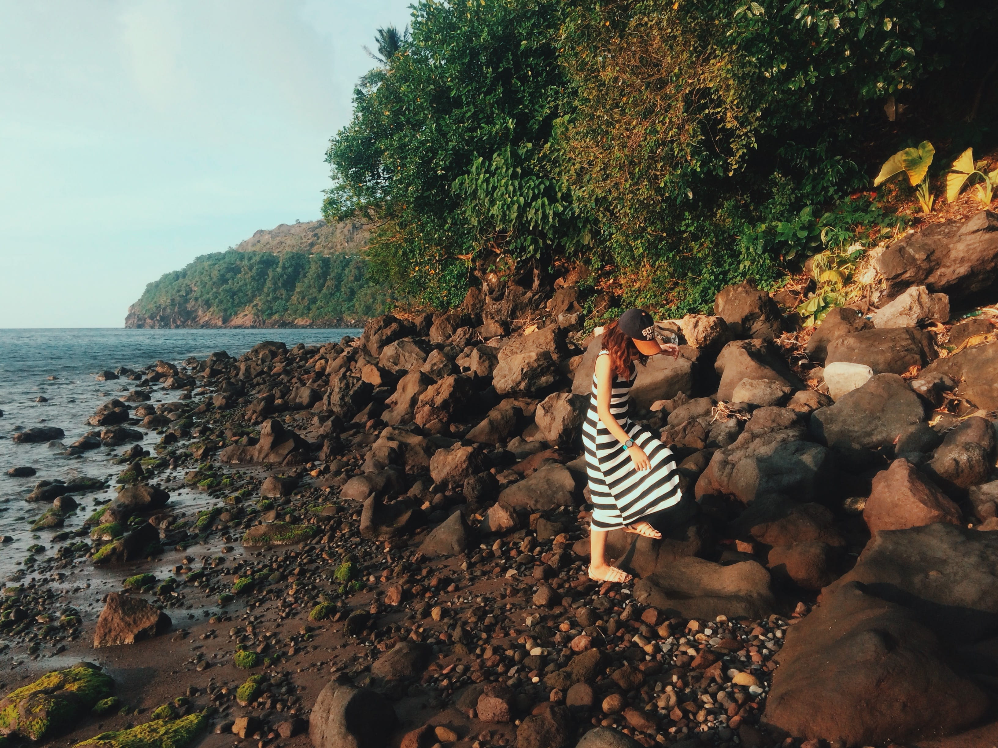 rocks, leisure activity, plant, sky, nature, people, solid, lifestyles, stepping, ocean, beach, sea, land, adult, never give up, real people, beauty in nature, HD Wallpaper