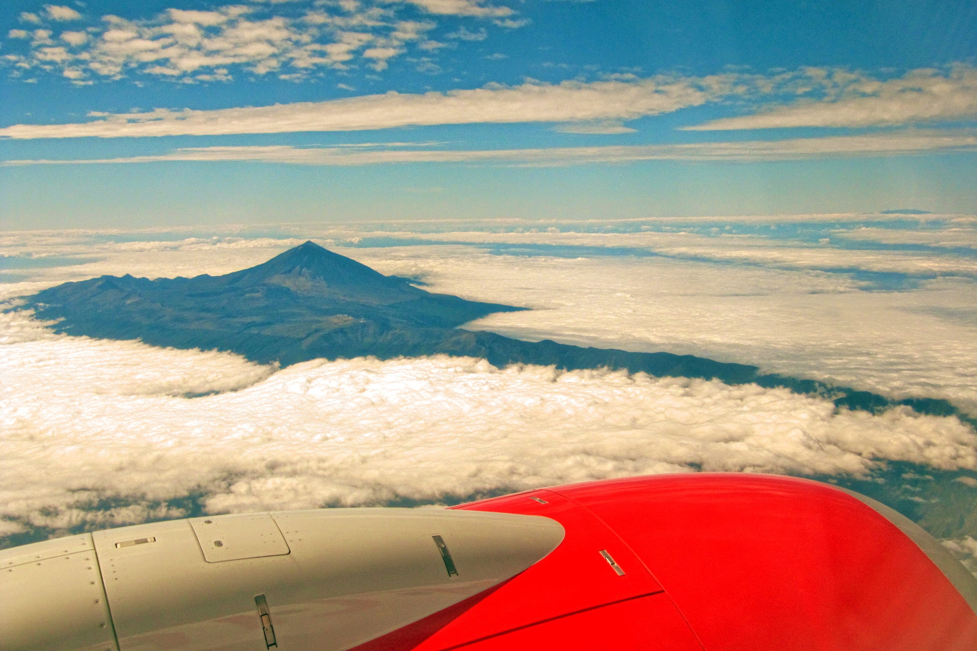 air, scenics - nature, Mountain, flying, on the move, engine, above, volcano, 2K, mode of transportation, scenics, mid, aircraft wing, gray, sky, no people, HD Wallpaper