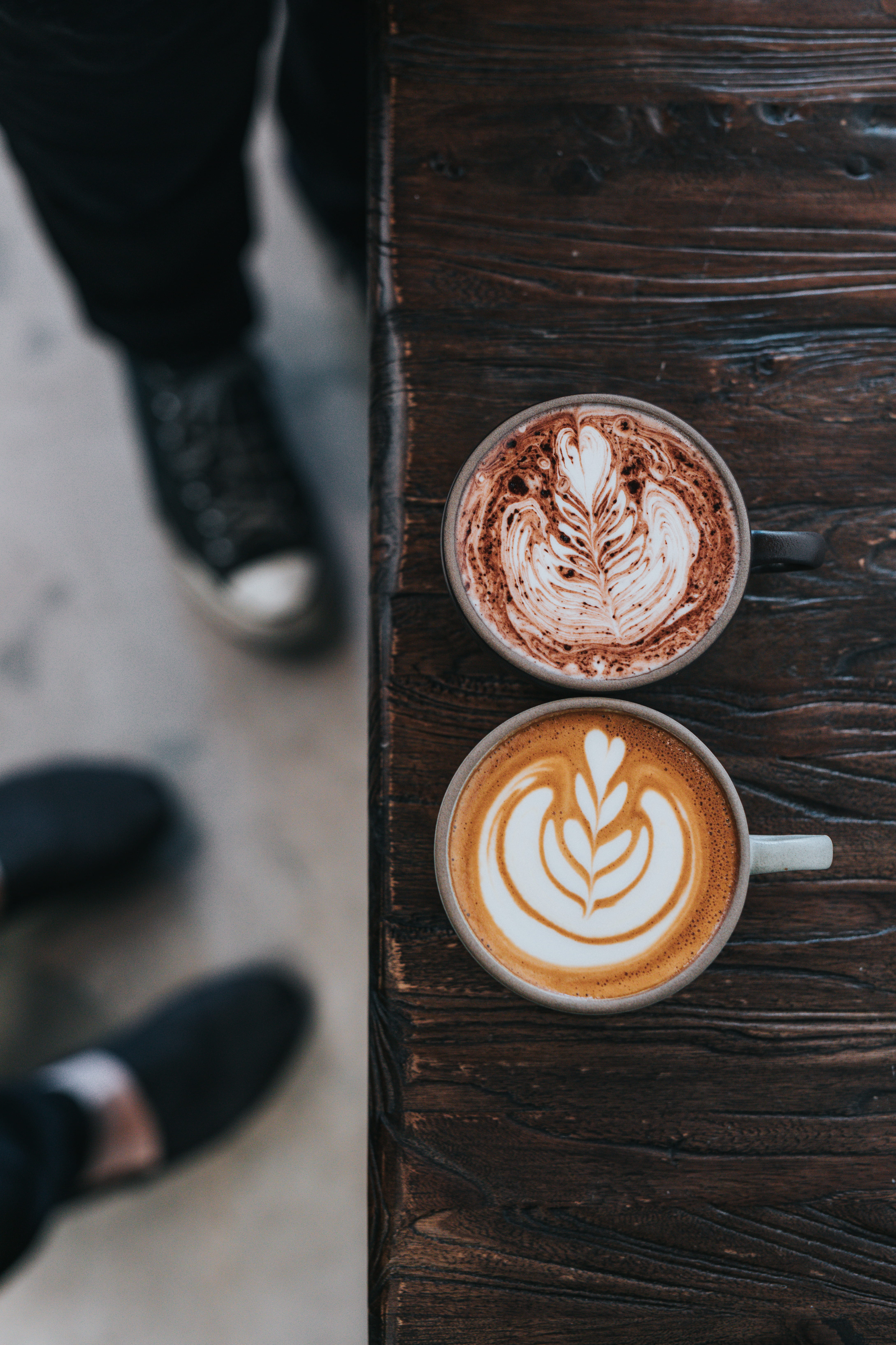 crockery, mug, frothy drink, table, cappuccino, photo, coffee lover, mugs, shallow, human foot, one person, shoe, low section, cup, body part, human body part, Phone HD Wallpaper