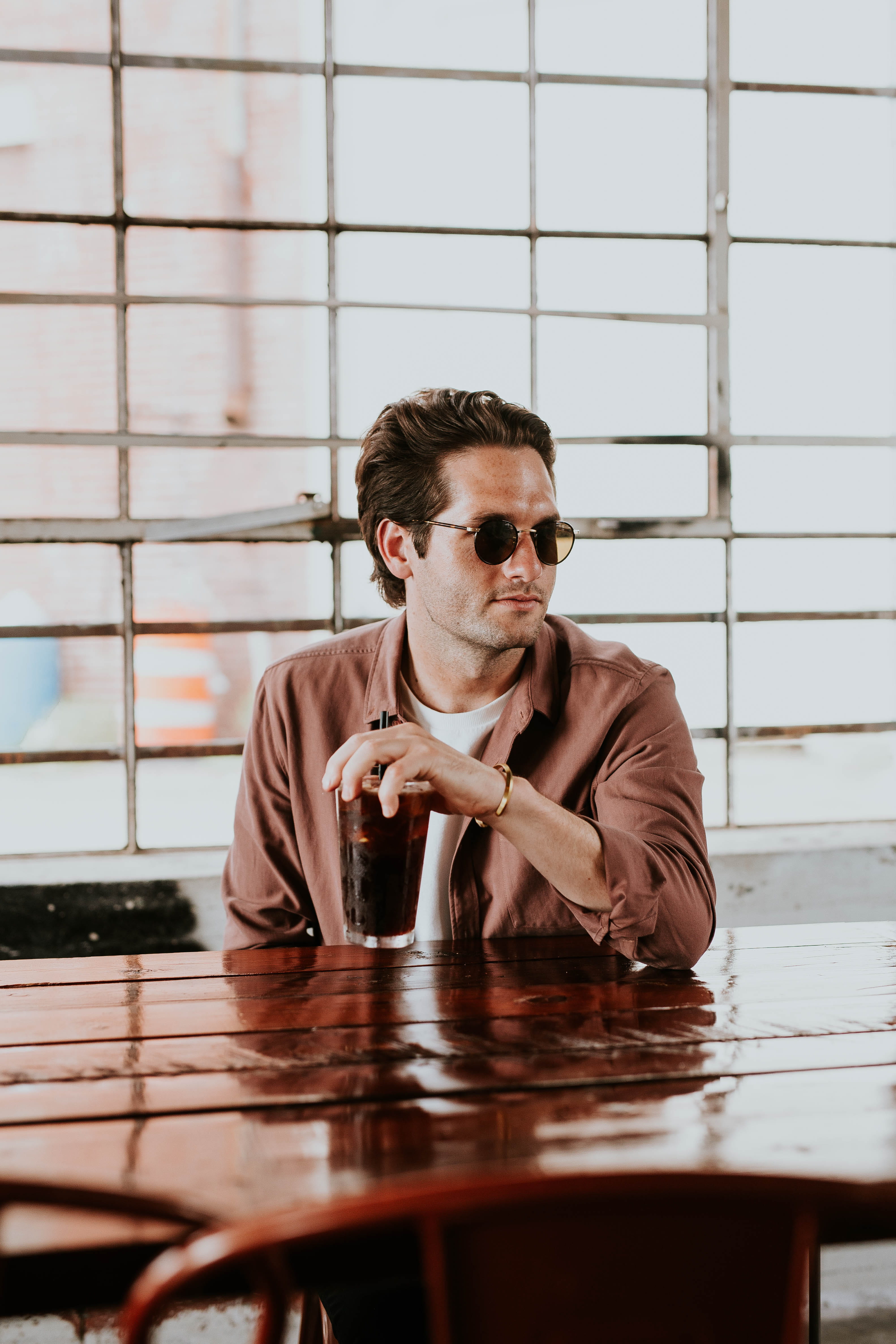 real people, window, sitting, s, brown, urban Scene, mid adult men, caucasian, day, modern, portrait, sunglass, outdoors, man, males, men, leisure activity, Phone HD Wallpaper