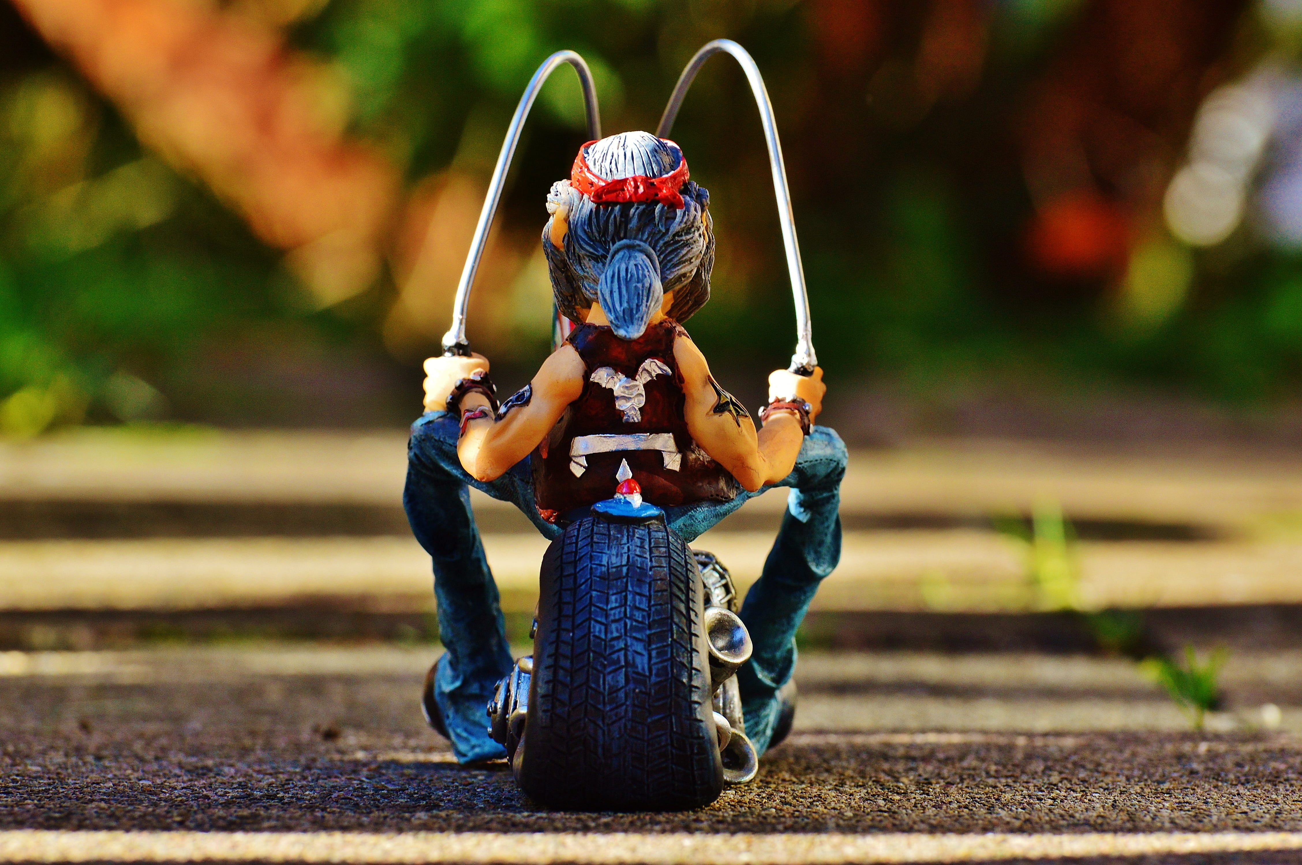 road, nature, sunlight, holding, full length, toy, dom, focus on foreground, jeans, person, adult, sitting, day, leisure activity, biker, tattooed, 4K, HD Wallpaper