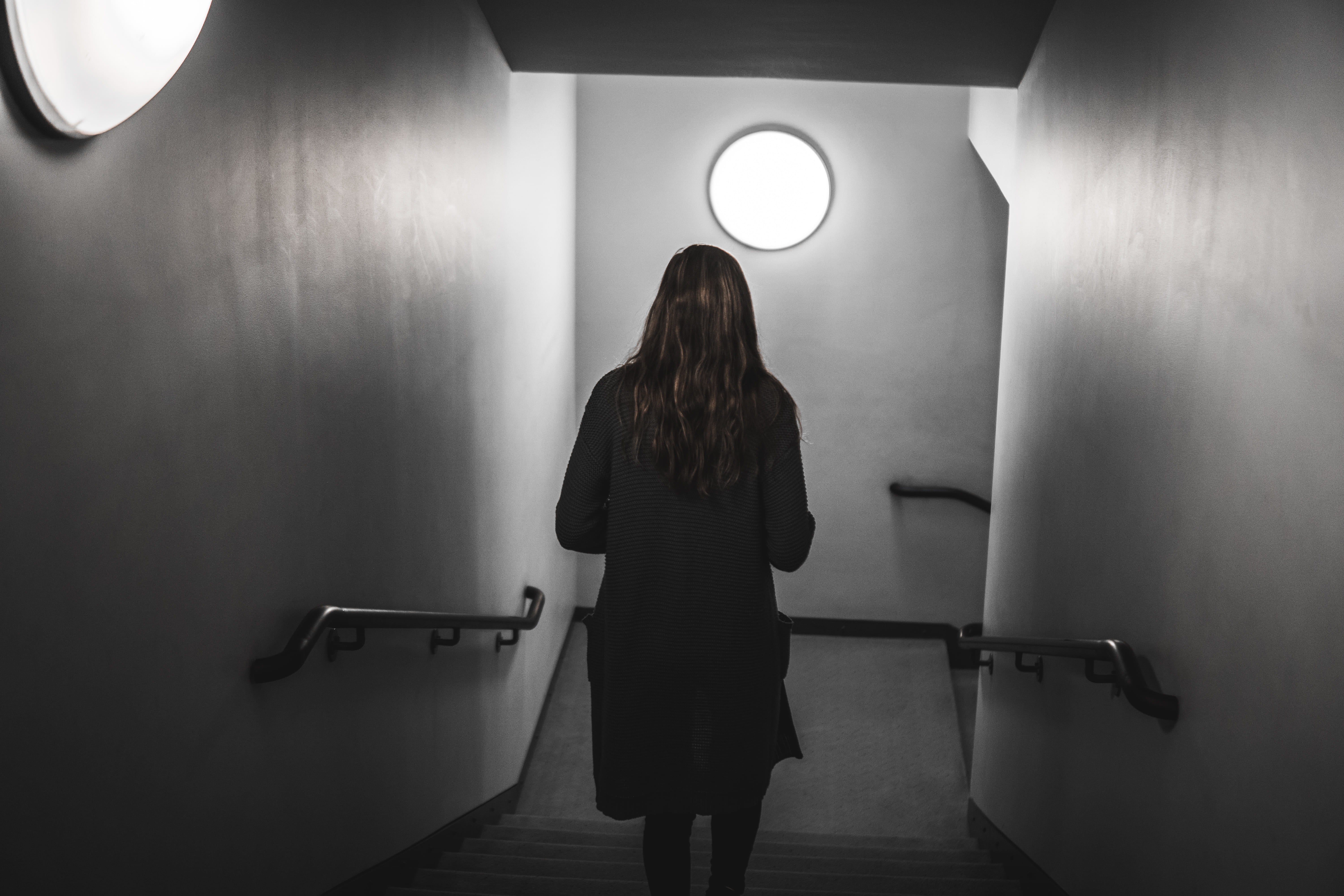 step, wall - building feature, girl, young adult, walk, long hair, downstairs, staircase, standing, walking, indoors, black and white, rear view, electric lamp, HD Wallpaper