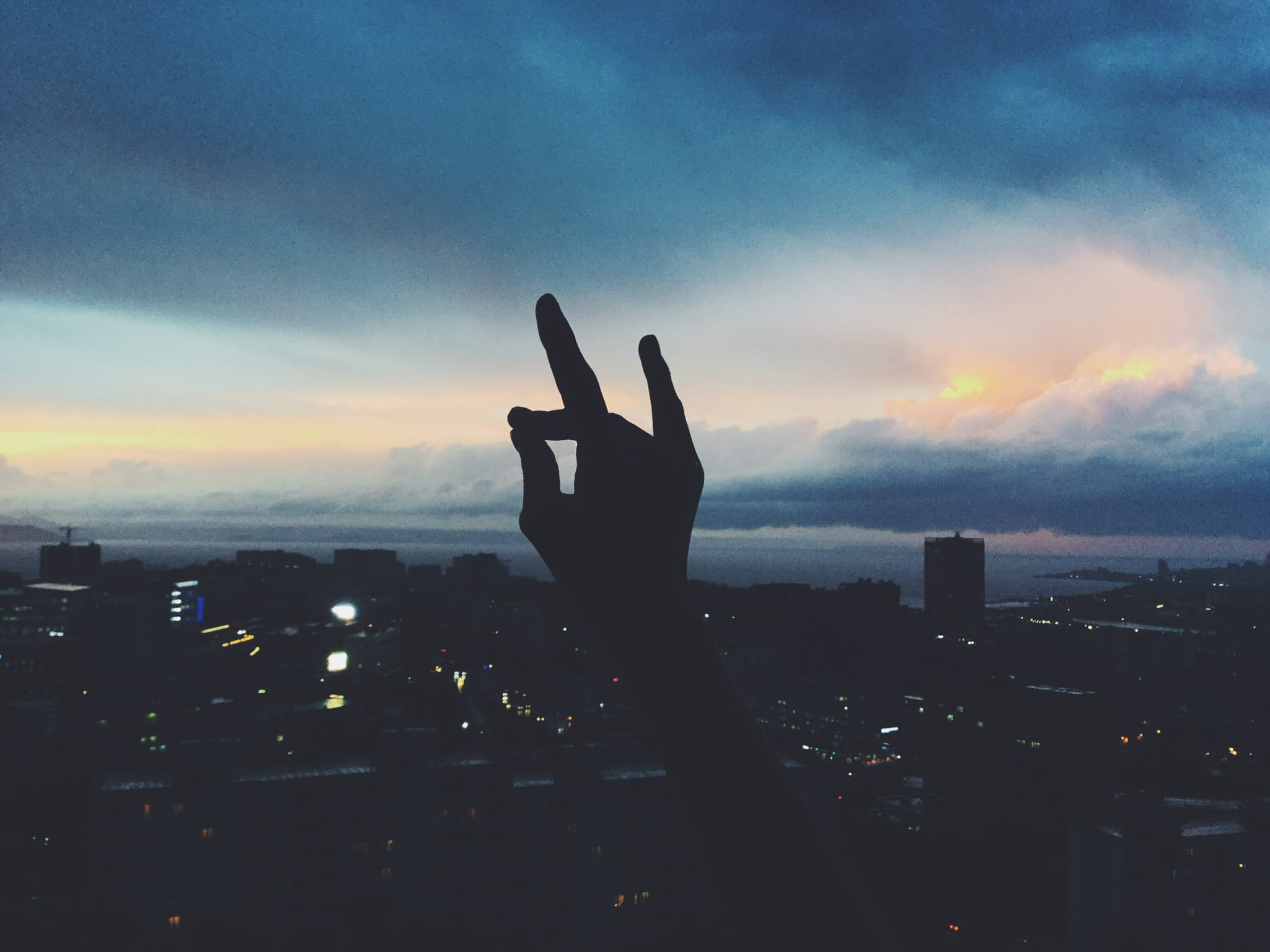 cloud - sky, body part, 1080P, finger, human limb, city, evening, one person, human body part, clouds, silhouette, nature, sunset, lights, gesturing, sky, HD Wallpaper