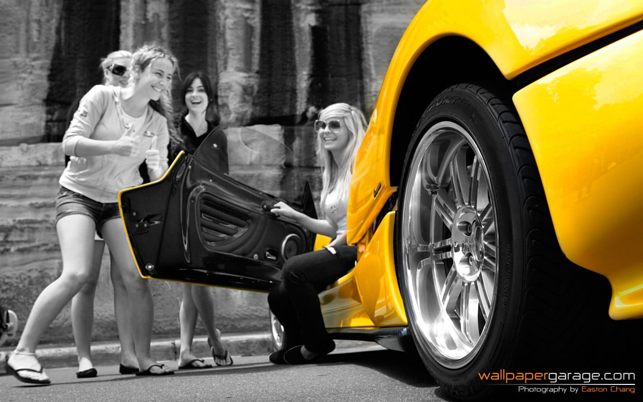 vehicle, car, tire, human representation, Pagani, day, 720P, standing, transportation, adult, motor vehicle, people, mode of transportation, side view, HD Wallpaper