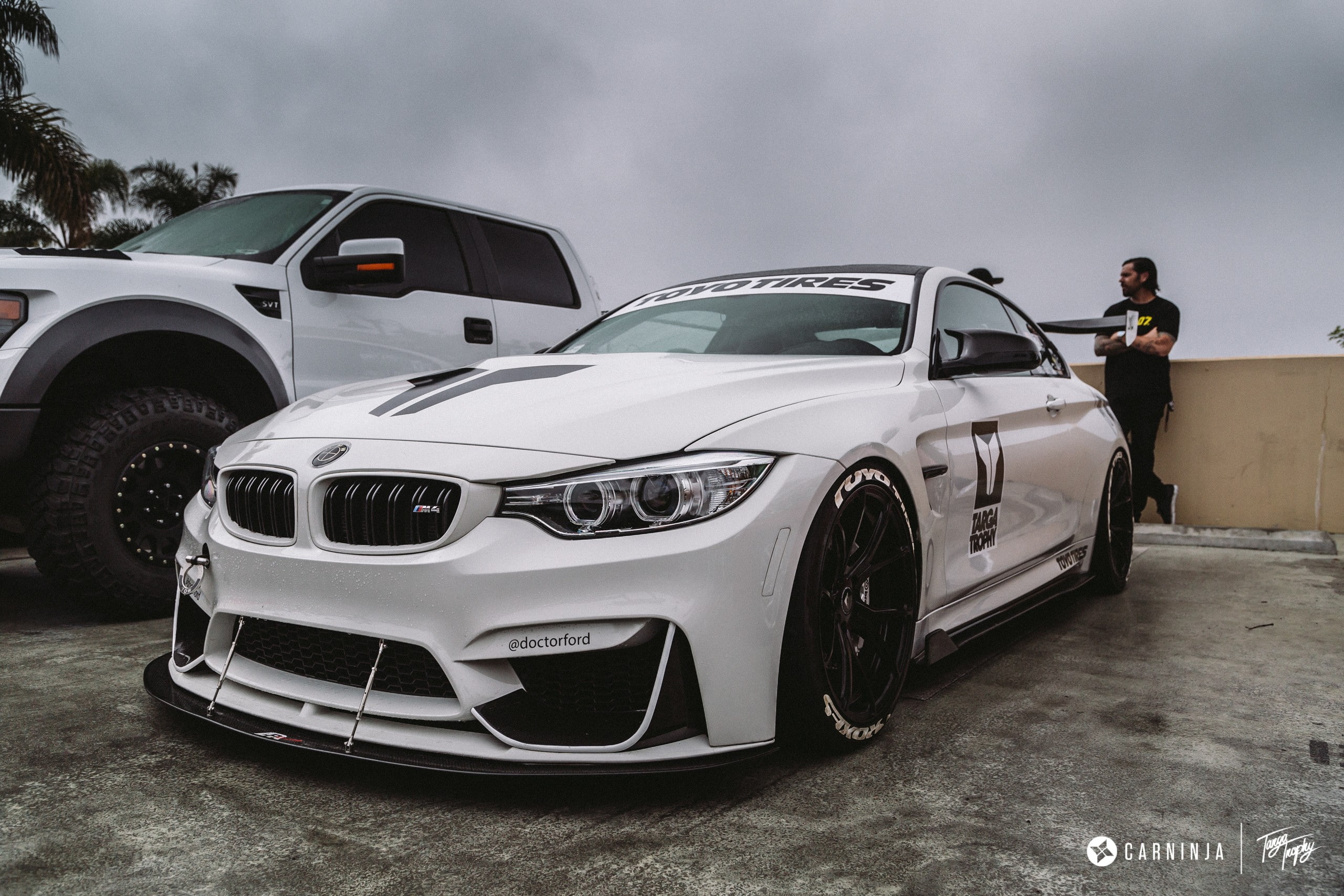 side view, BMW M4 Coupe, sky, day, sports car, one person, Carninja, real people, car, luxury, transportation, low, 2K, land vehicle, mode of transportation, HD Wallpaper