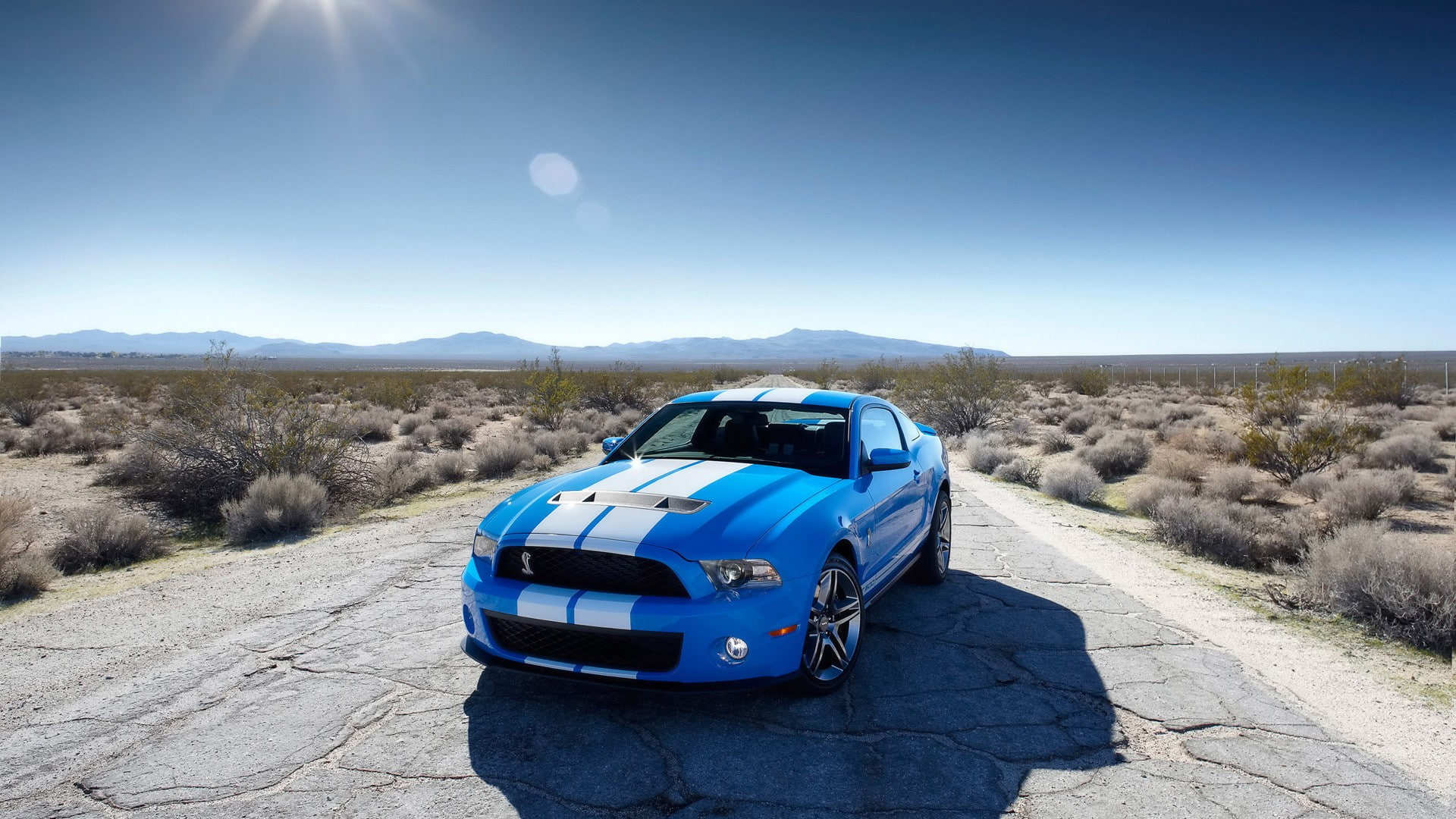 blue, road, climate, car, desert, sunlight, travel, transportation, mode of transportation, environment, motor vehicle, day, nature, no people, Ford Mustang Shelby, HD Wallpaper