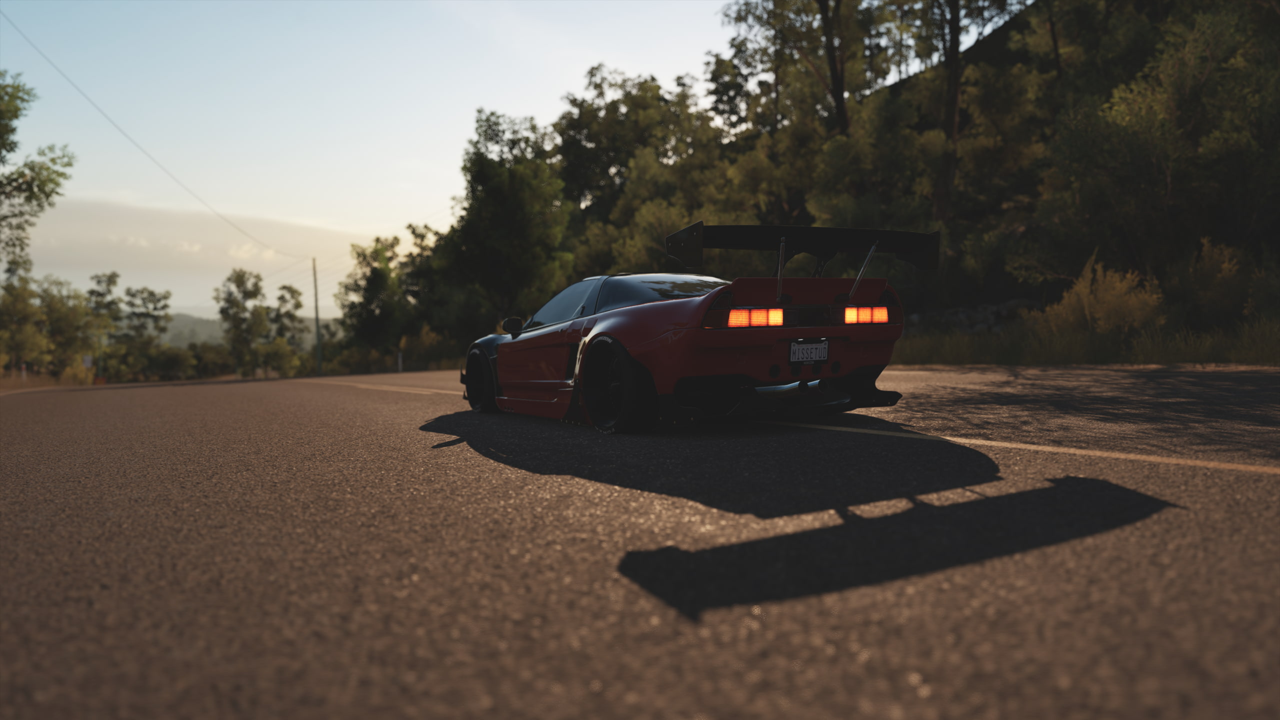motor vehicle, sunny, Rocket Bunny, video games, outdoors, nature, sign, 2K, plant, tree, forza horizon 3, city, road, 2K, no people, surface level, selective focus, HD Wallpaper