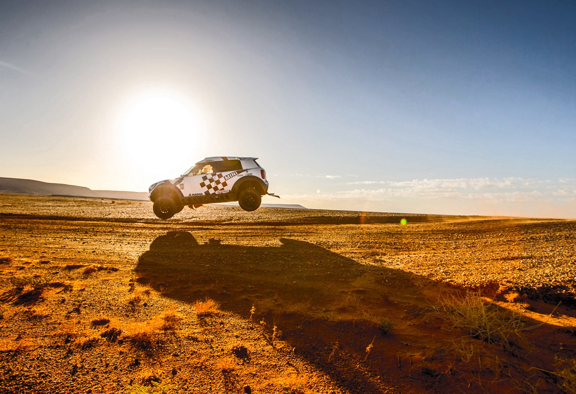 Sport, Flies, Dune, The sun, X-Raid, Raid, Rally, Mini, Race, Sunset, The sky, Speed, 1080P, Heat, MINI Cooper, White, Shadow, Sand, Jump, Desert, HD Wallpaper