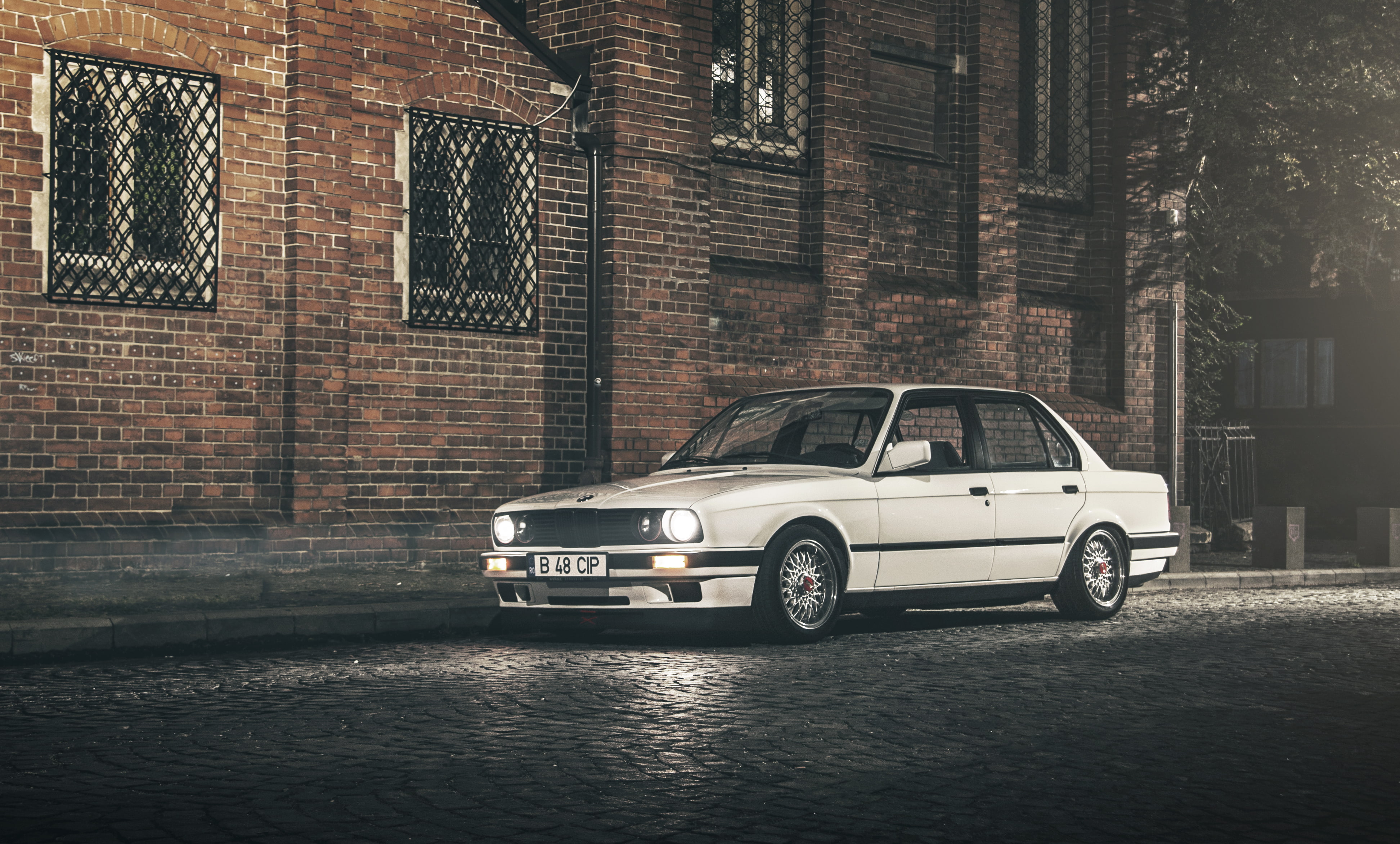 land vehicle, day, BMW, 3 Series, outdoors, parking, retro styled, building exterior, travel, E30, architecture, white, car, brick, built structure, Sedan, HD Wallpaper