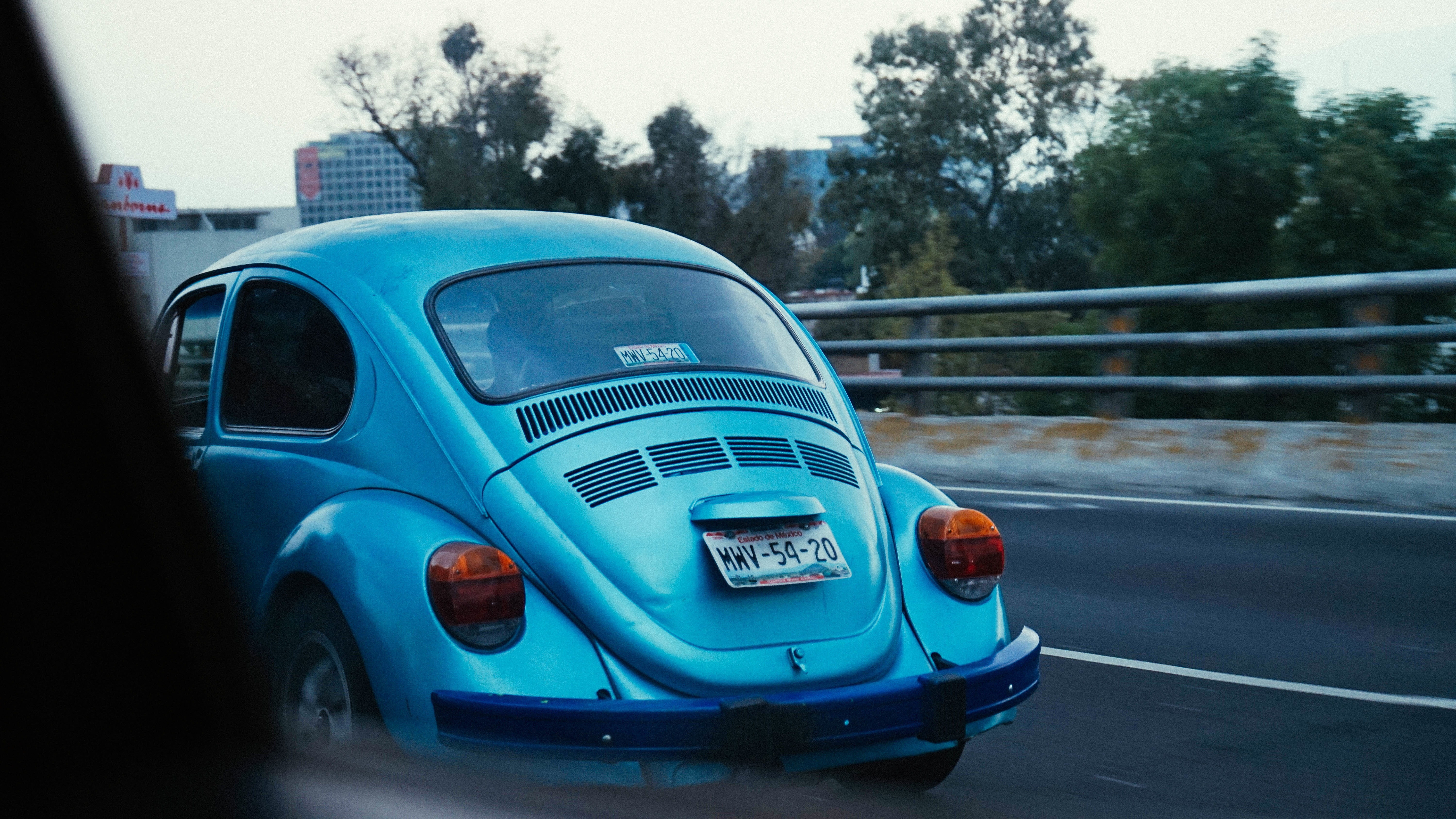 motion, outdoors, day, retro styled, trees, car, street, transportation, volks wagon, vehicle, road, plant, blue, plate number, mode of transportation, HD Wallpaper