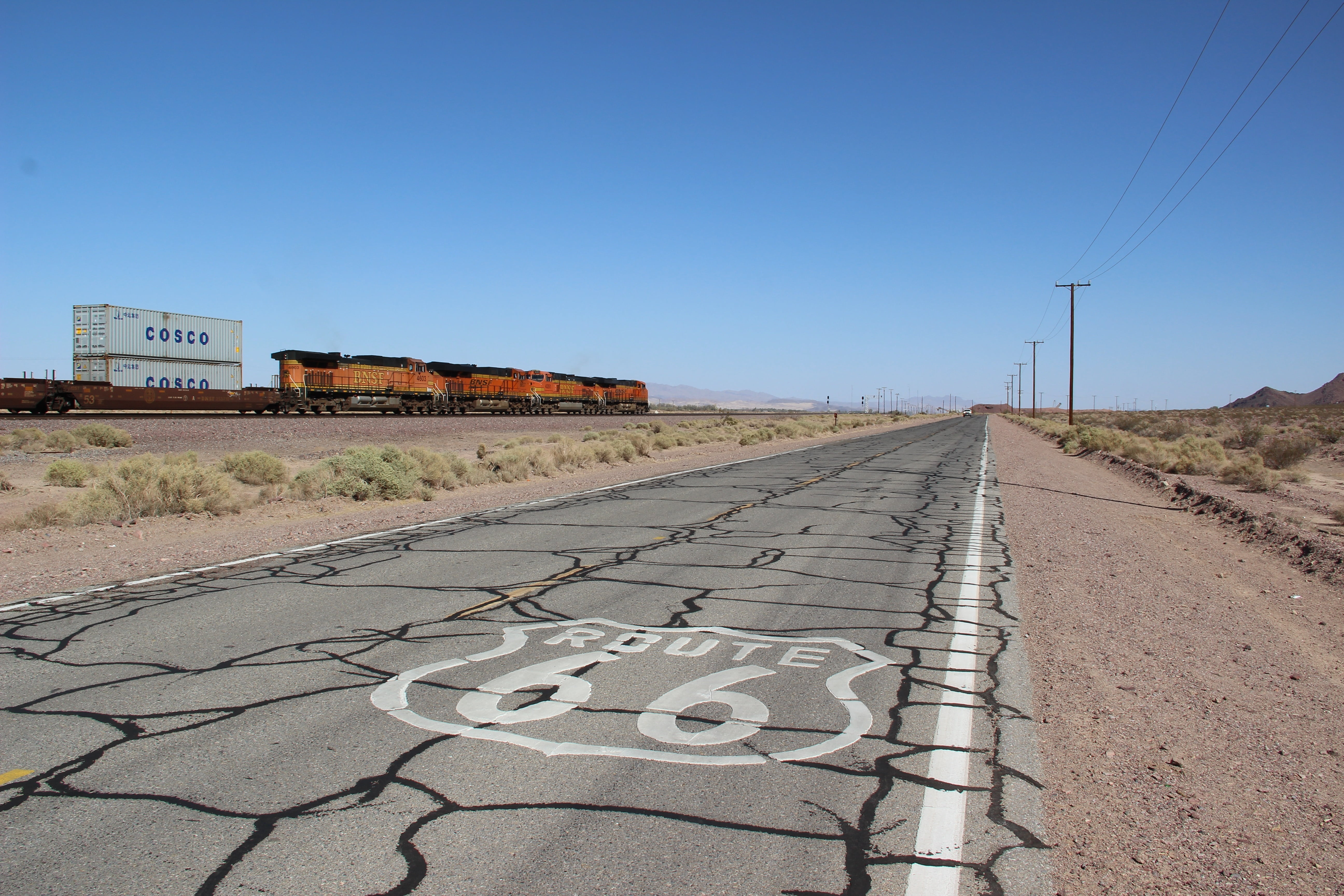 blue, architecture, side, climate, electricity, western script, nature, sky, day, usa, route66, no people, travel, sign, asphalt, outdoors, clear sky, train, HD Wallpaper